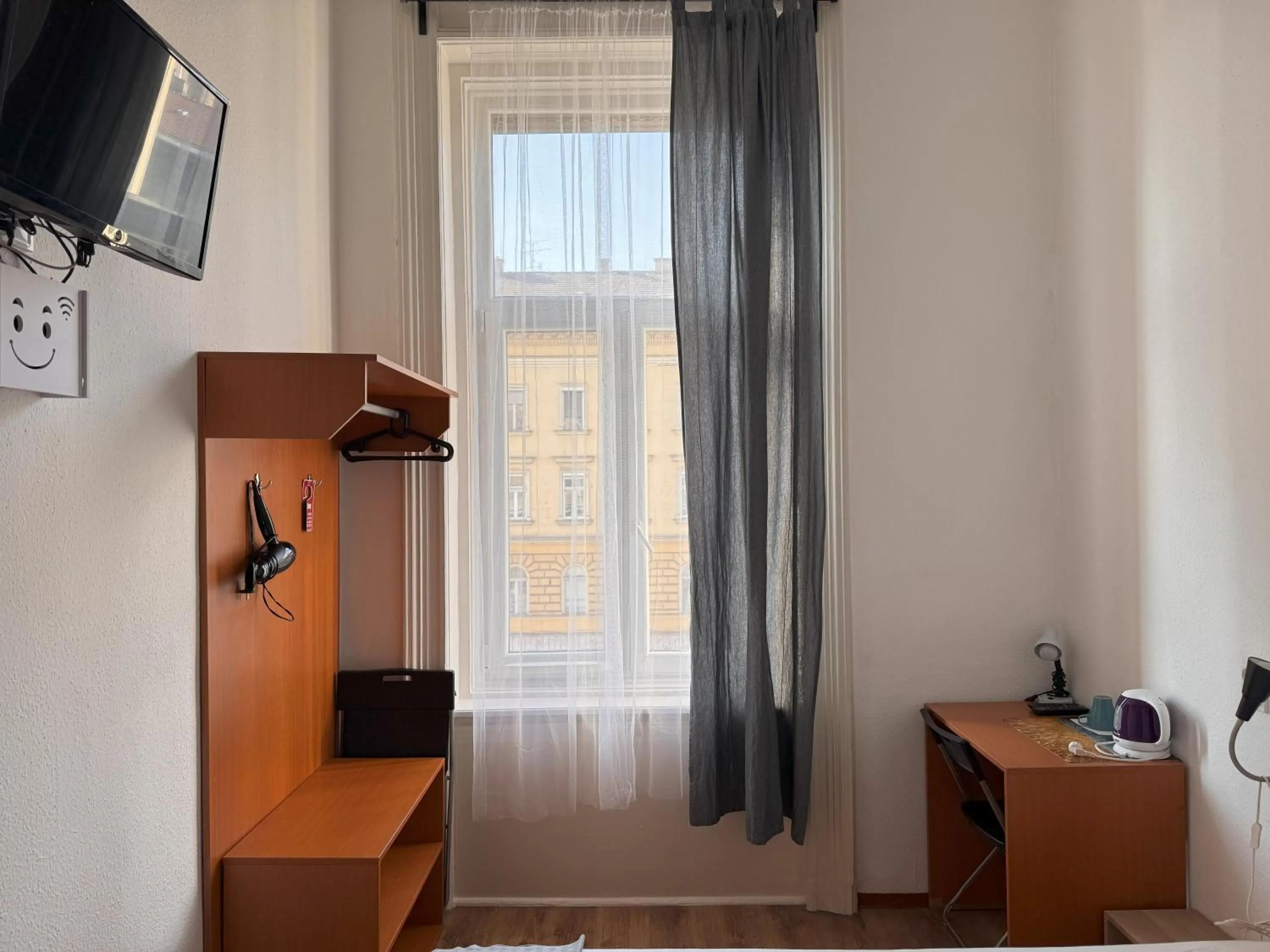 Photo of the whole room in Omega Guesthouse Budapest