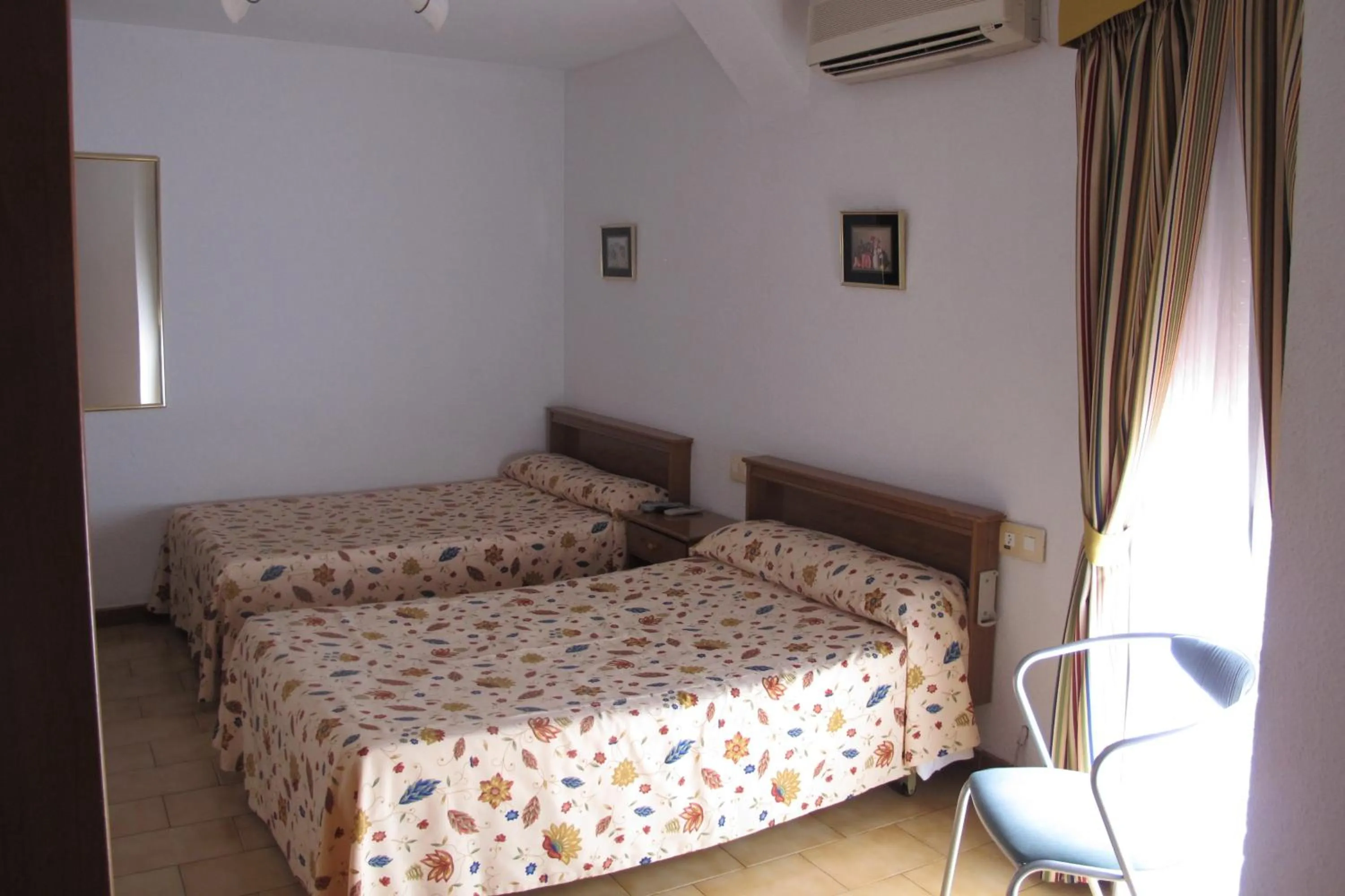Photo of the whole room, Bed in Hostal Casa Pepe