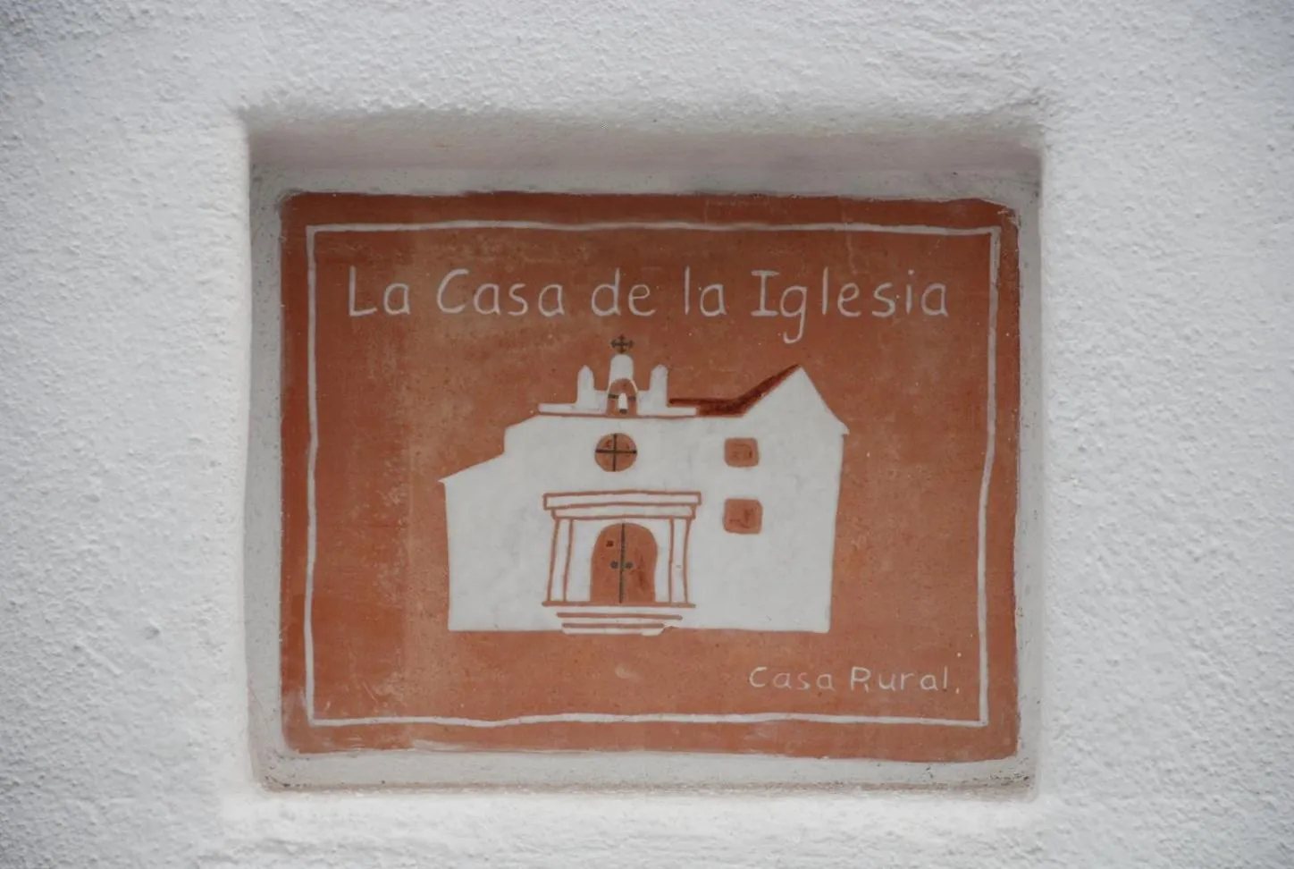 Property logo or sign in La Casa de la Iglesia