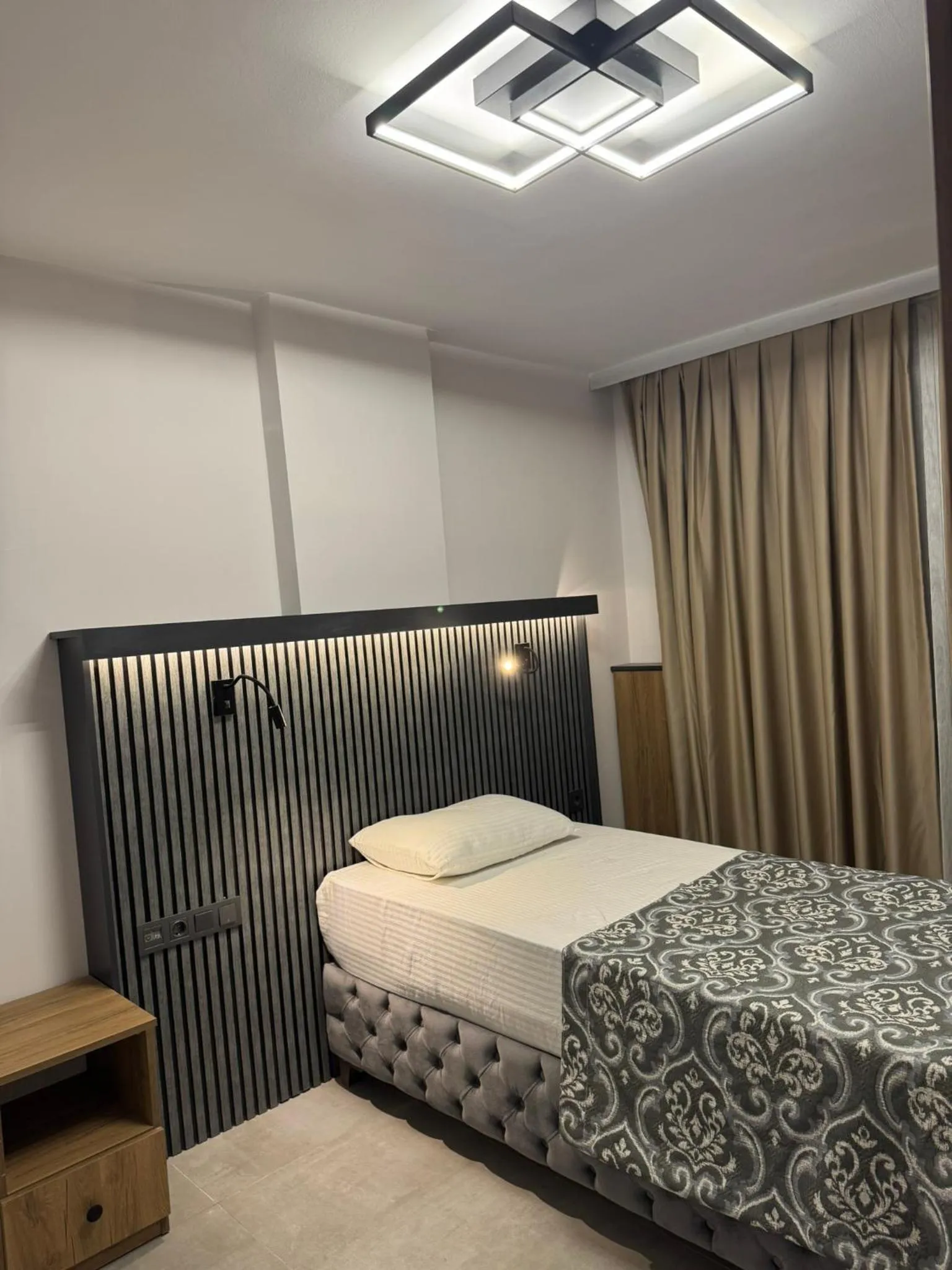 Bed in D'Premium Hotel