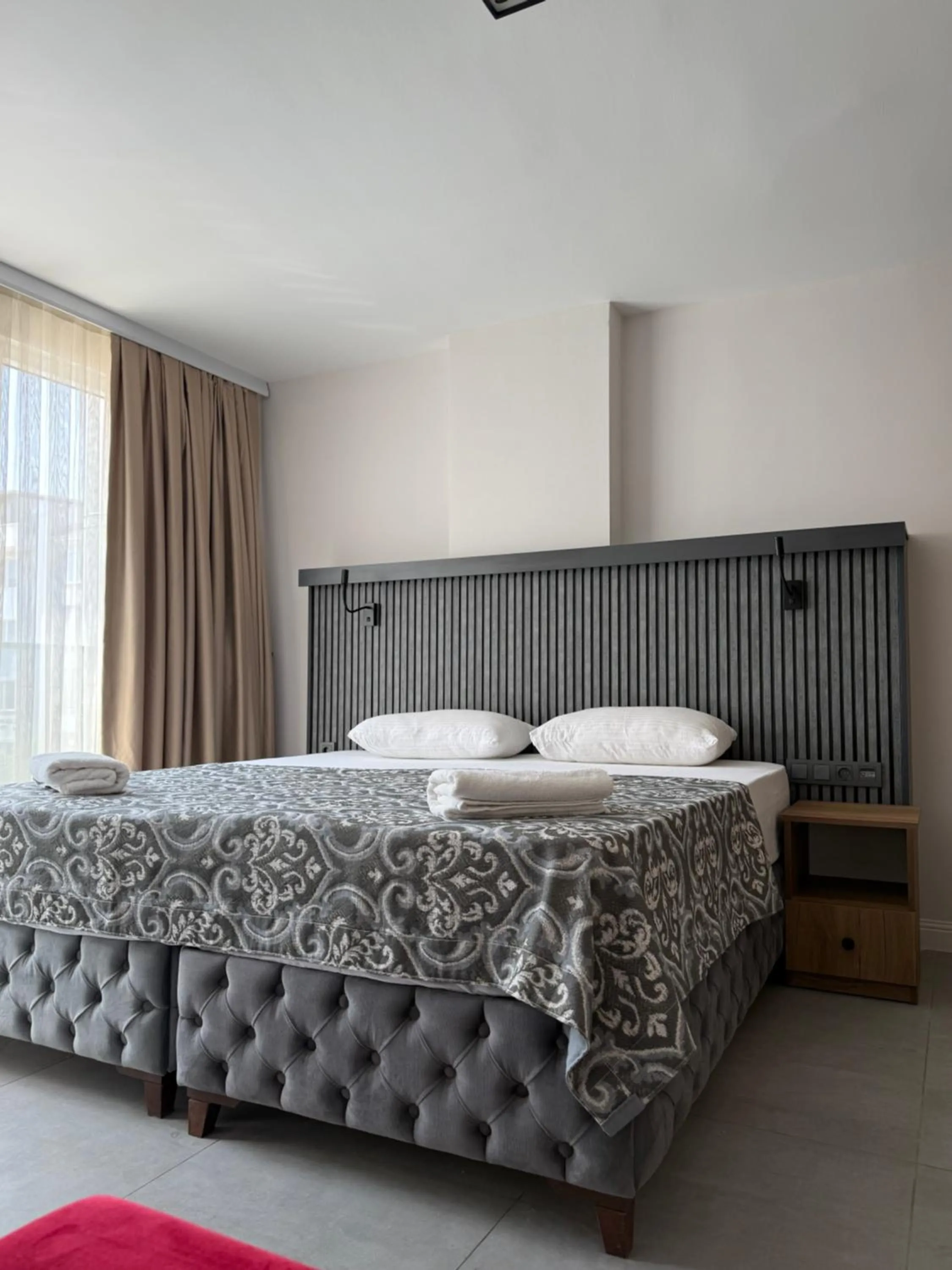 Bed in D'Premium Hotel