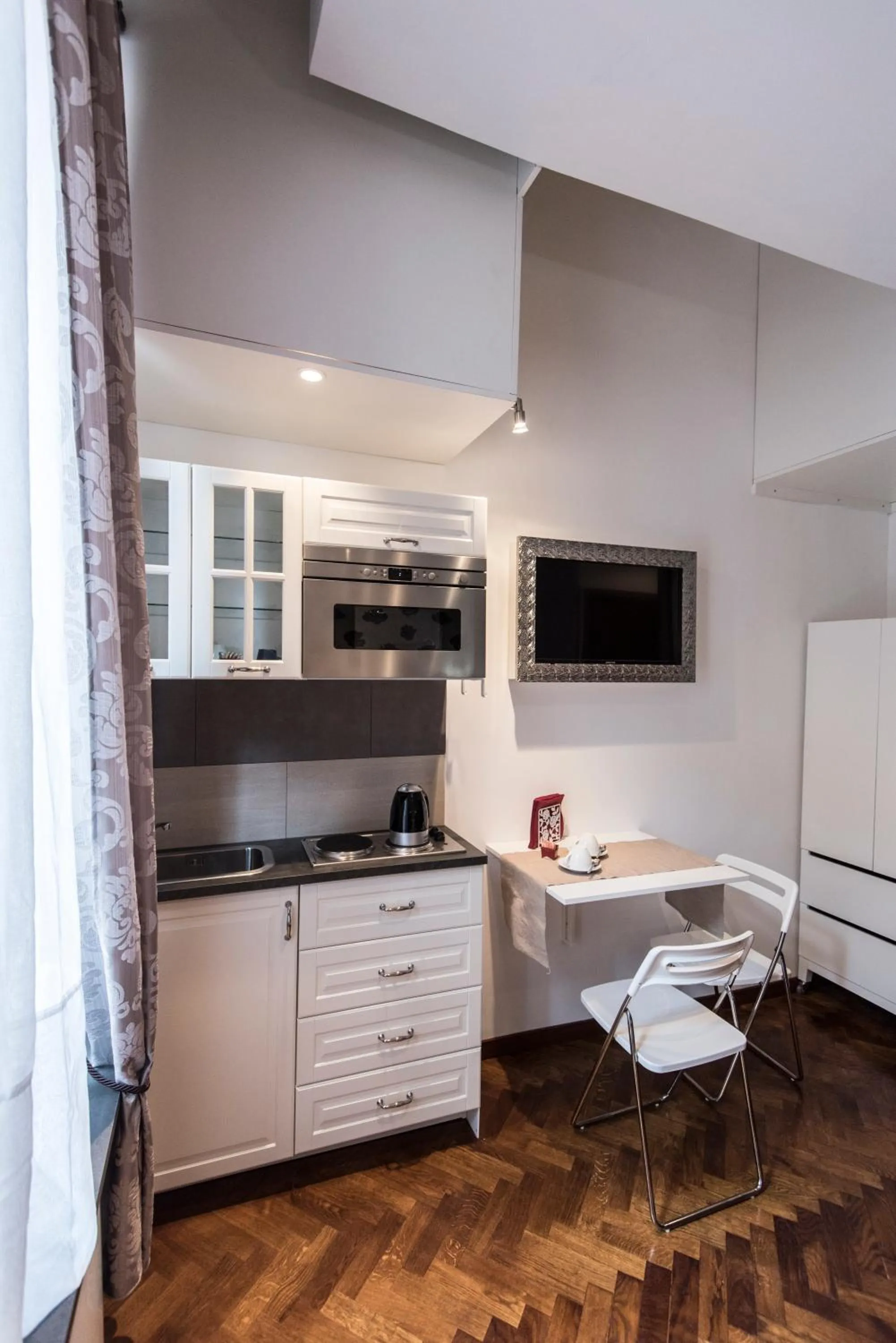 Kitchen or kitchenette in Vite Suites Guest House