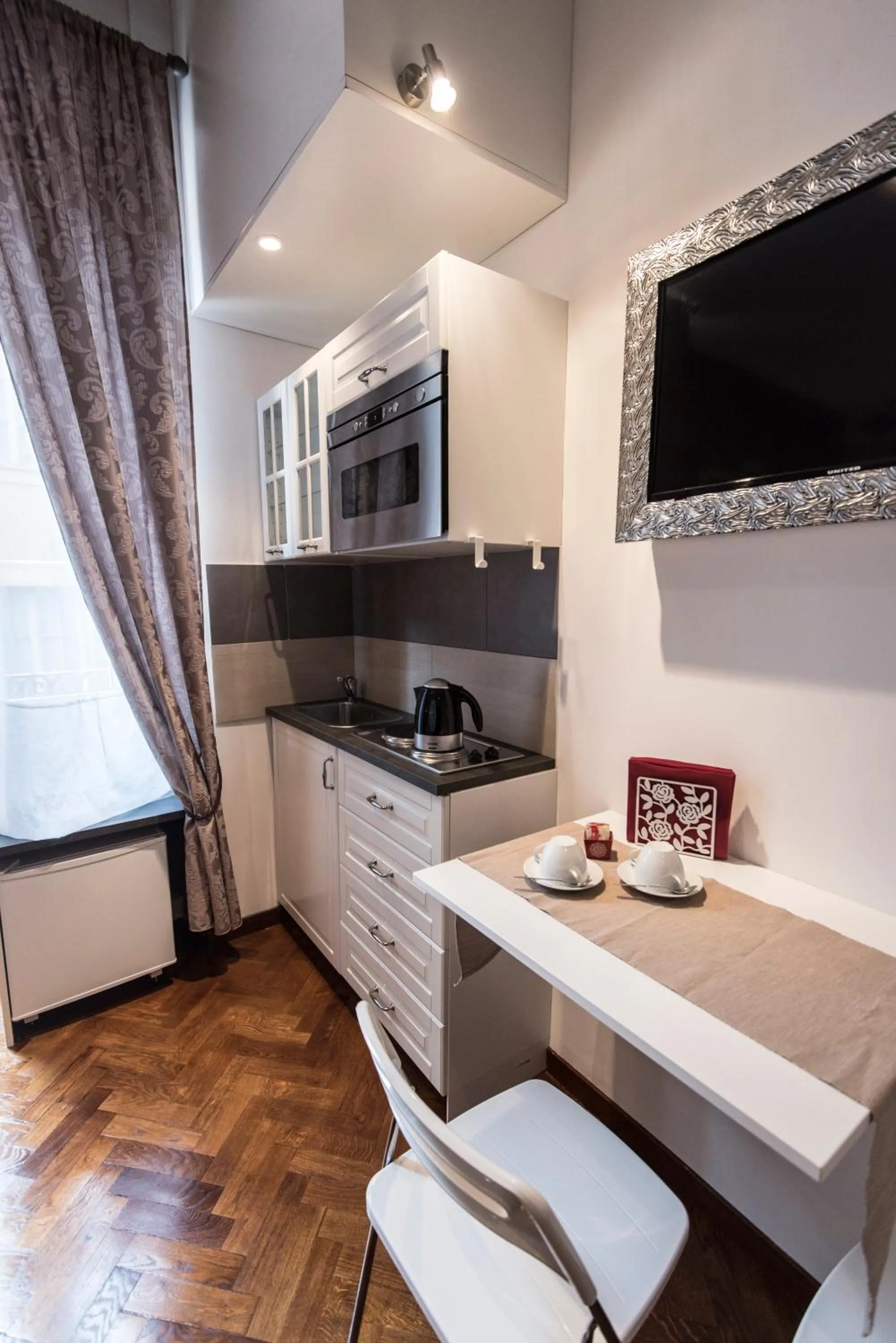 Kitchen or kitchenette in Vite Suites Guest House