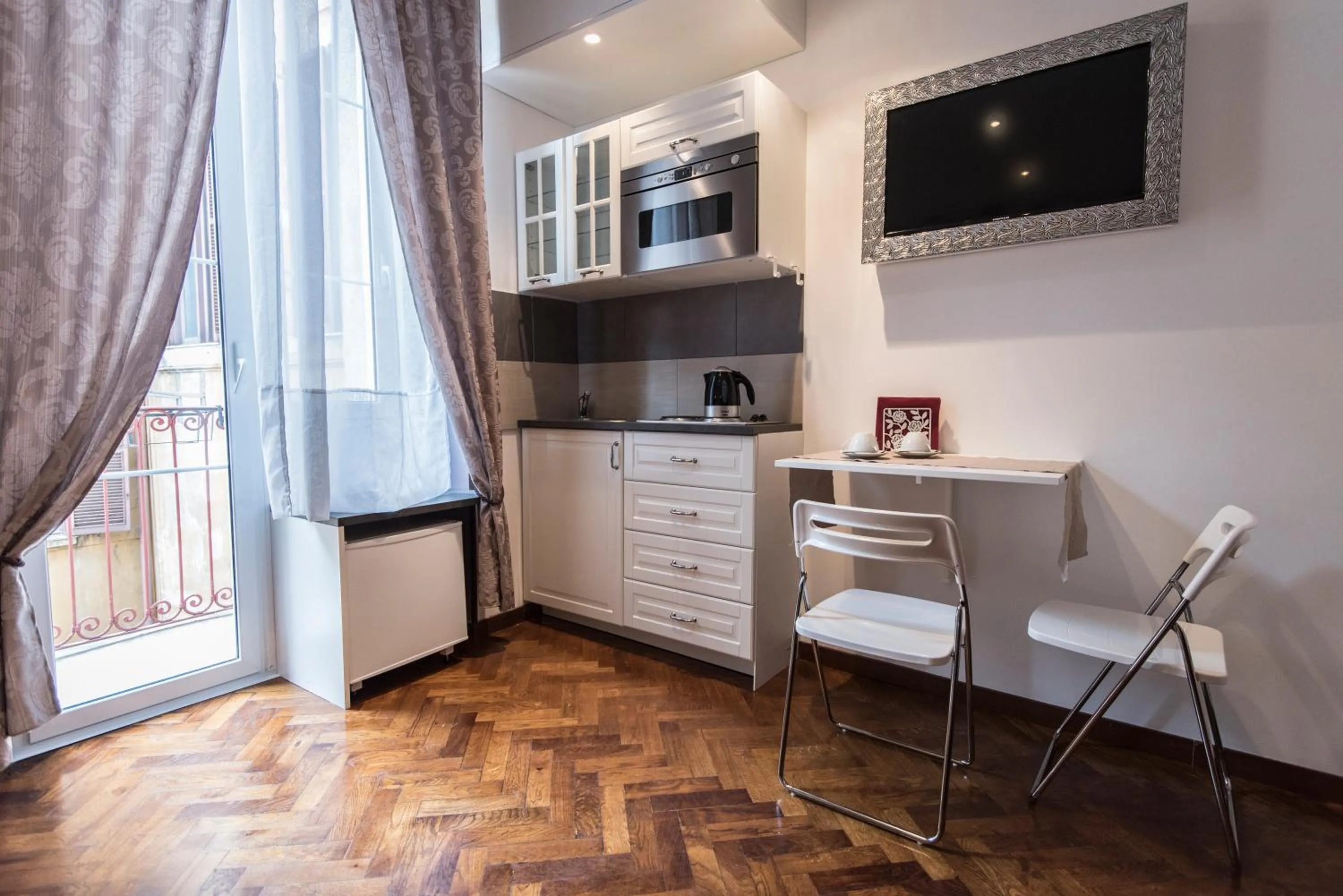 Kitchen or kitchenette in Vite Suites Guest House