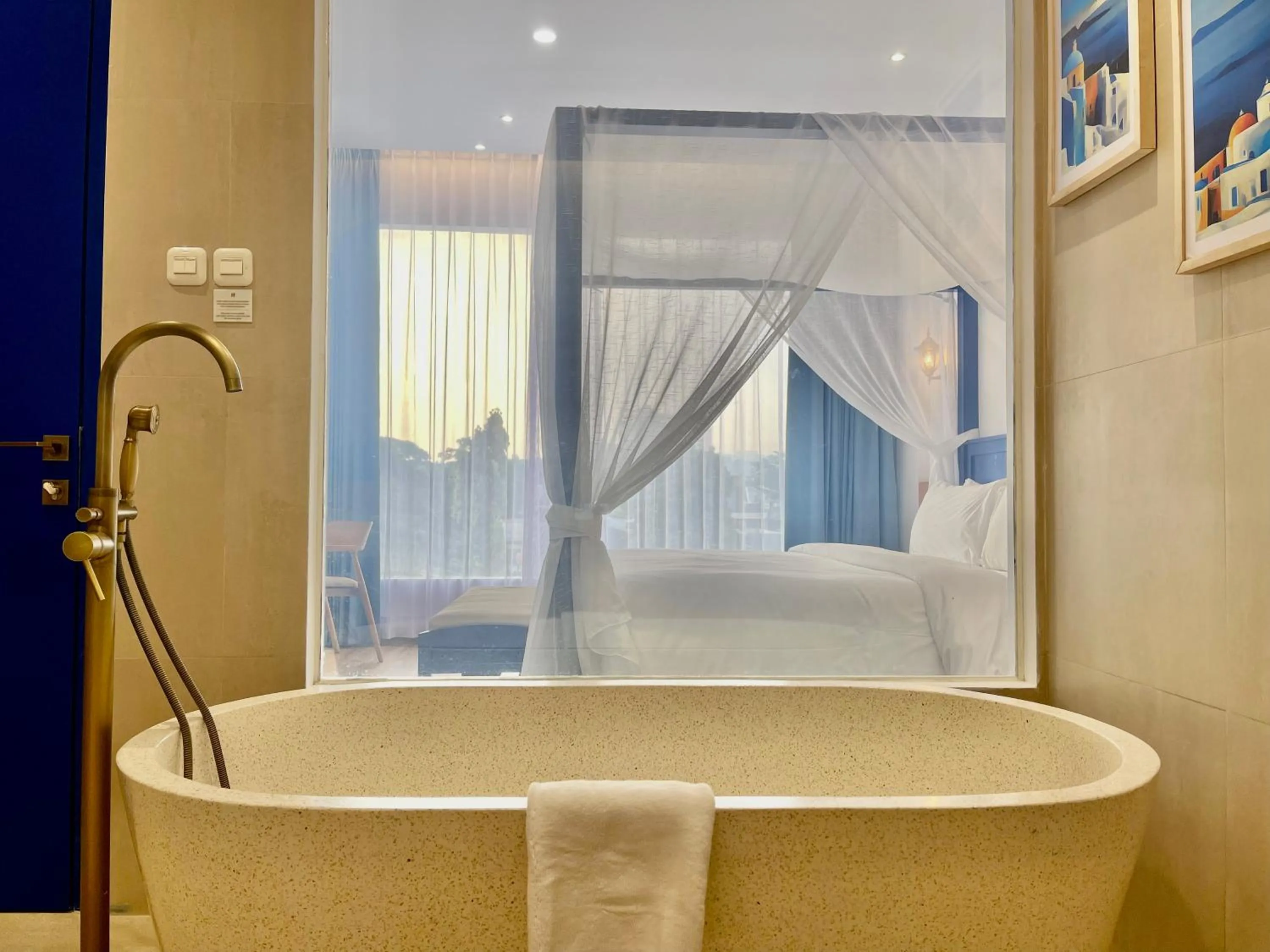 Bathroom, Bed in Hemangini Hotel Bandung