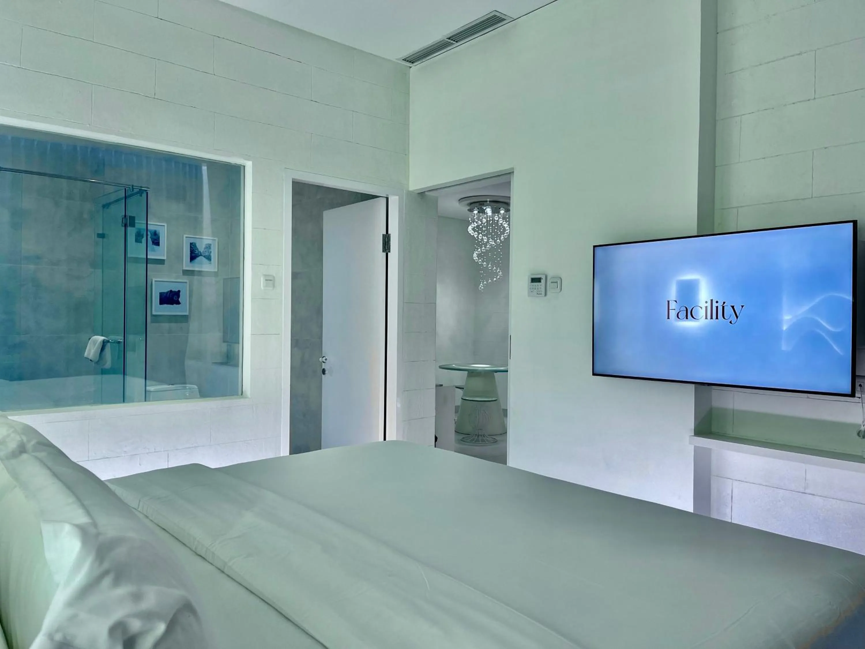 Bed in Hemangini Hotel Bandung