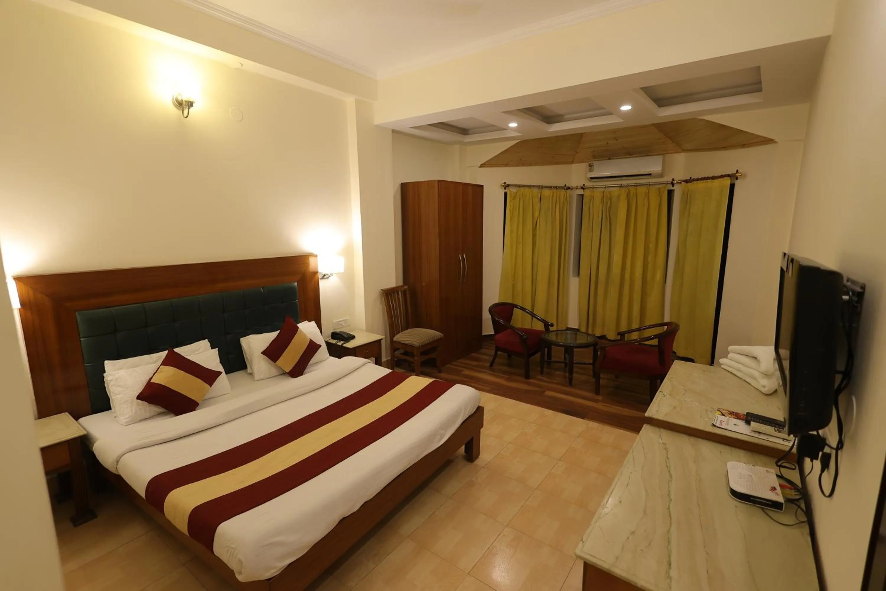 Seating area, Bed in Riverside Resorts