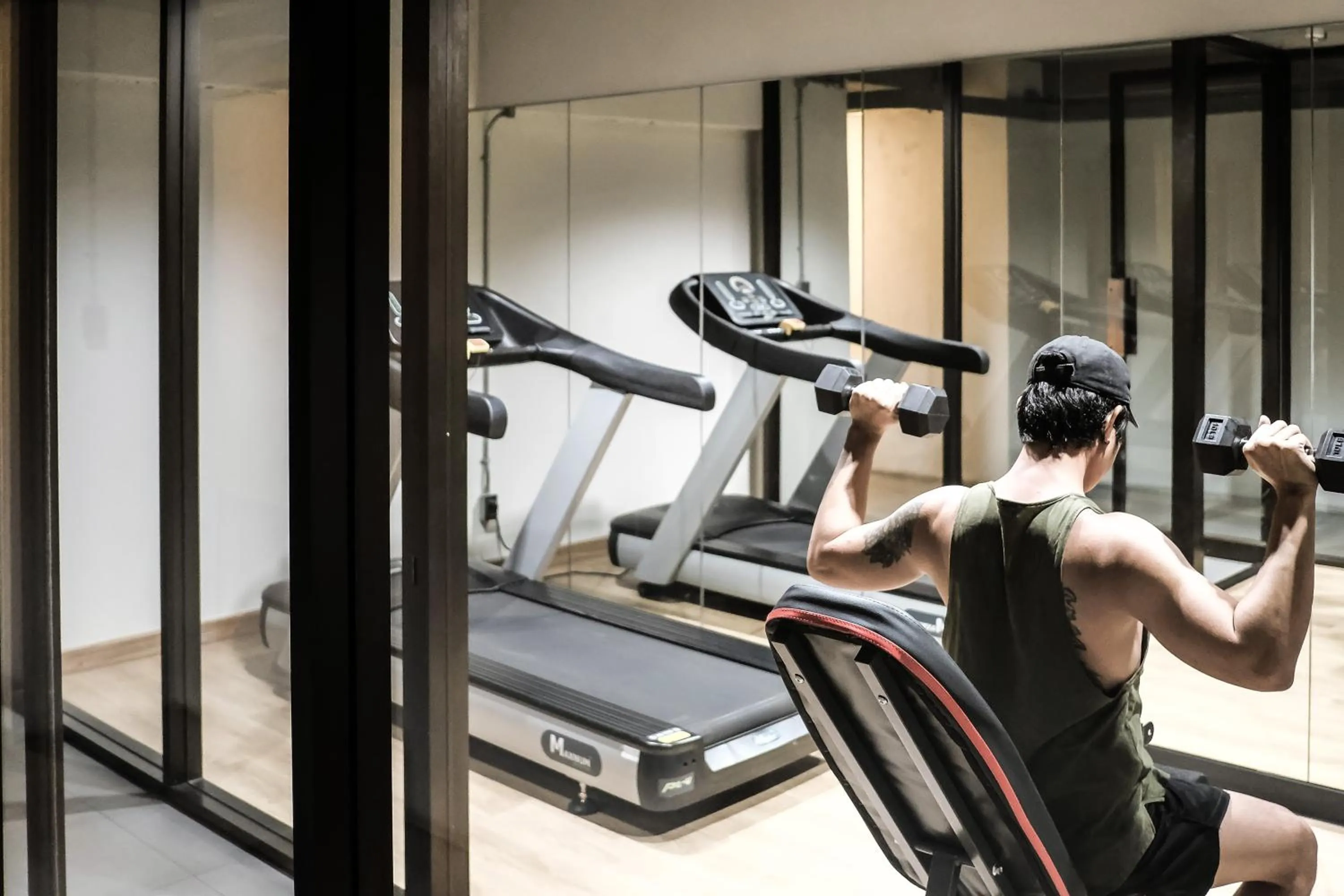 Fitness centre/facilities in THA City Loft by TH District