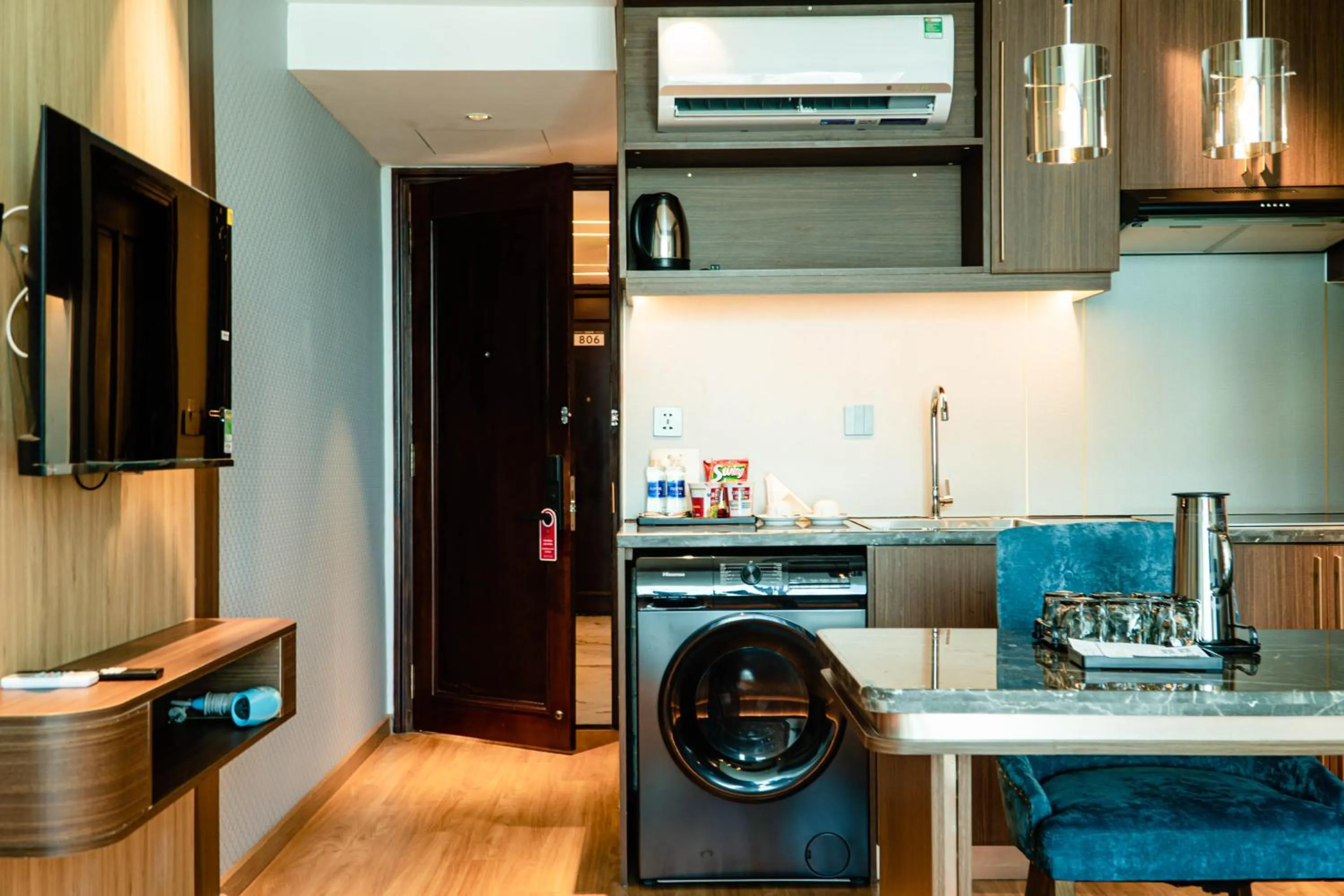 washing machine in Elite Luxury Hotel