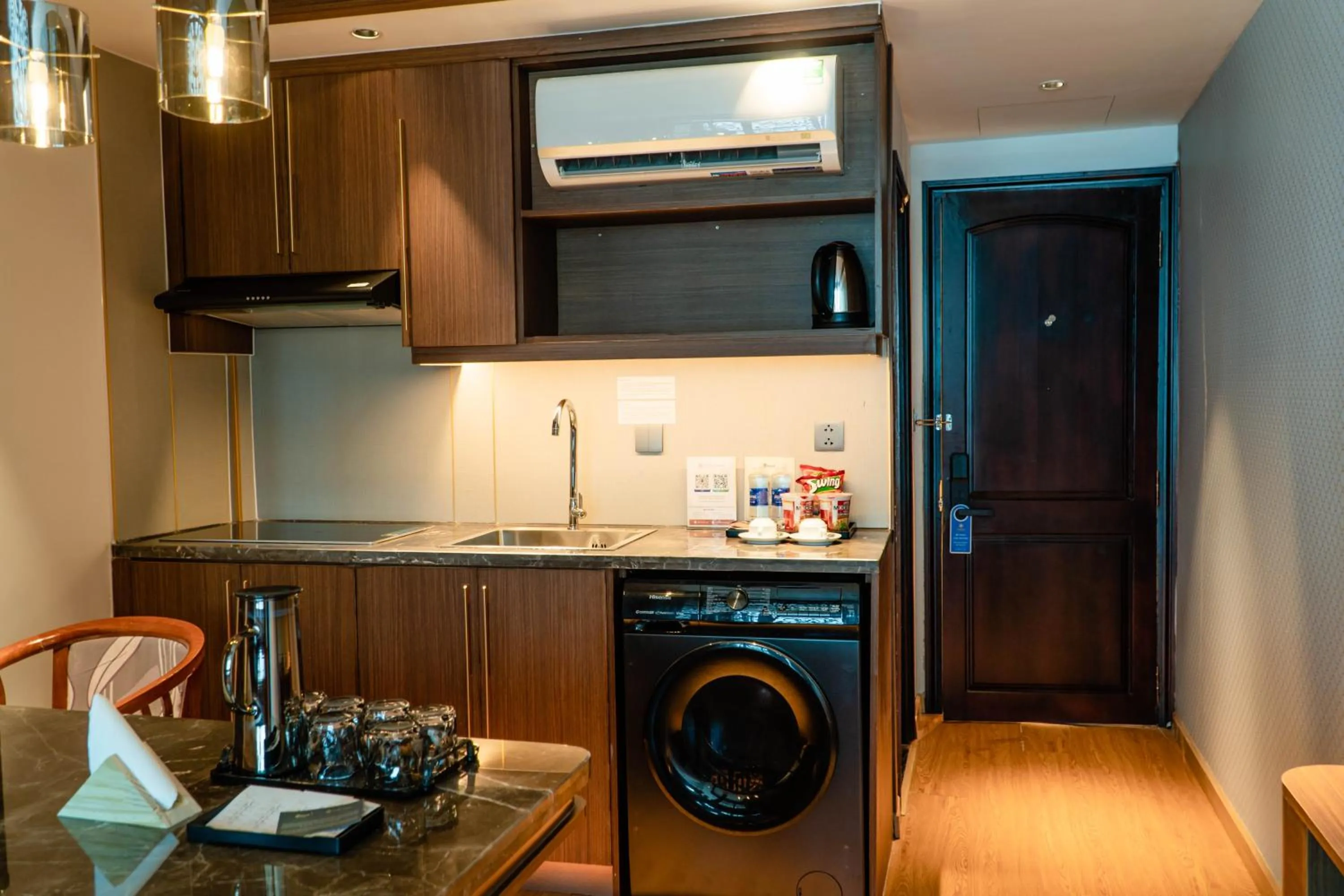 washing machine in Elite Luxury Hotel