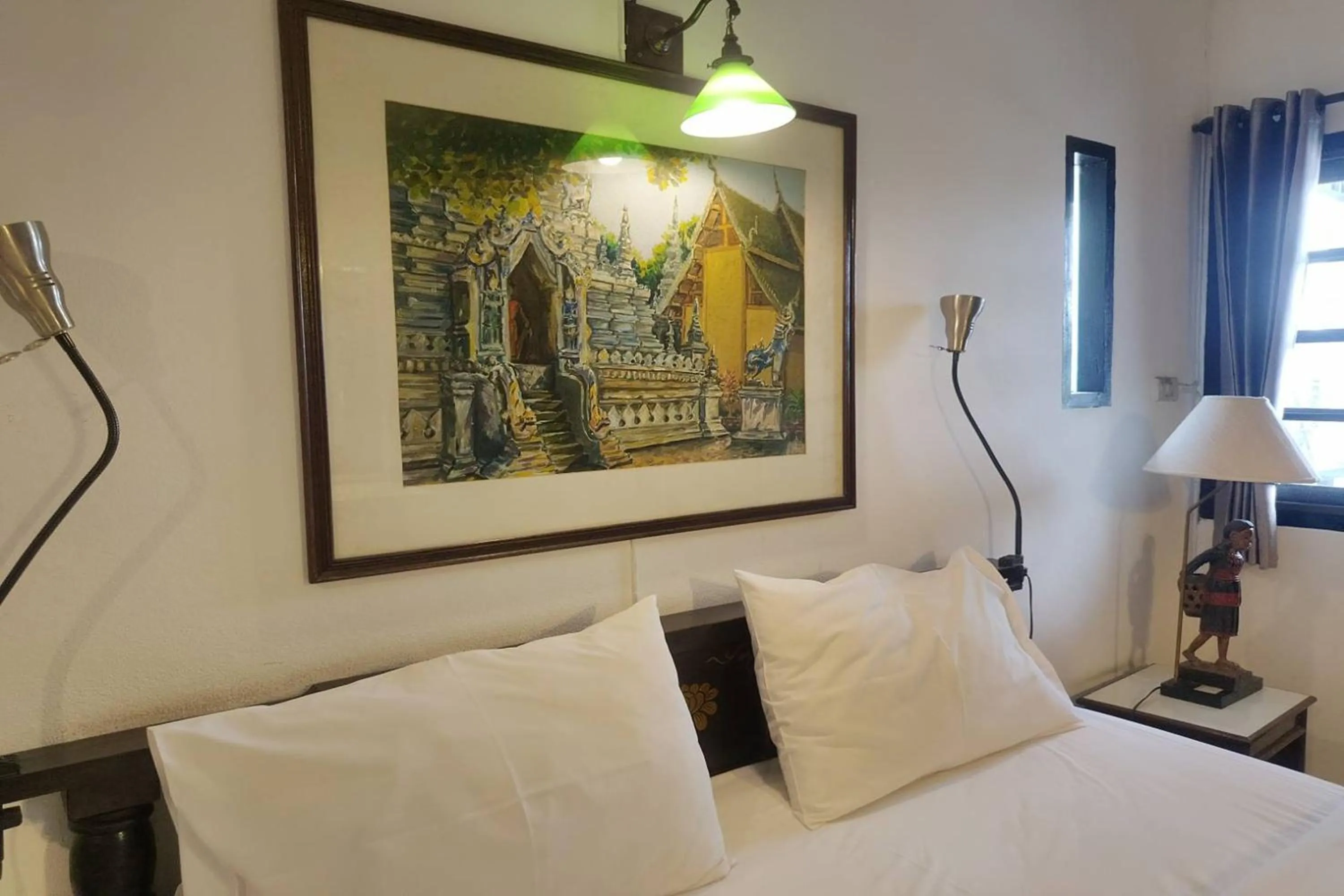 Bed in Baan Orawee Boutique Hotel