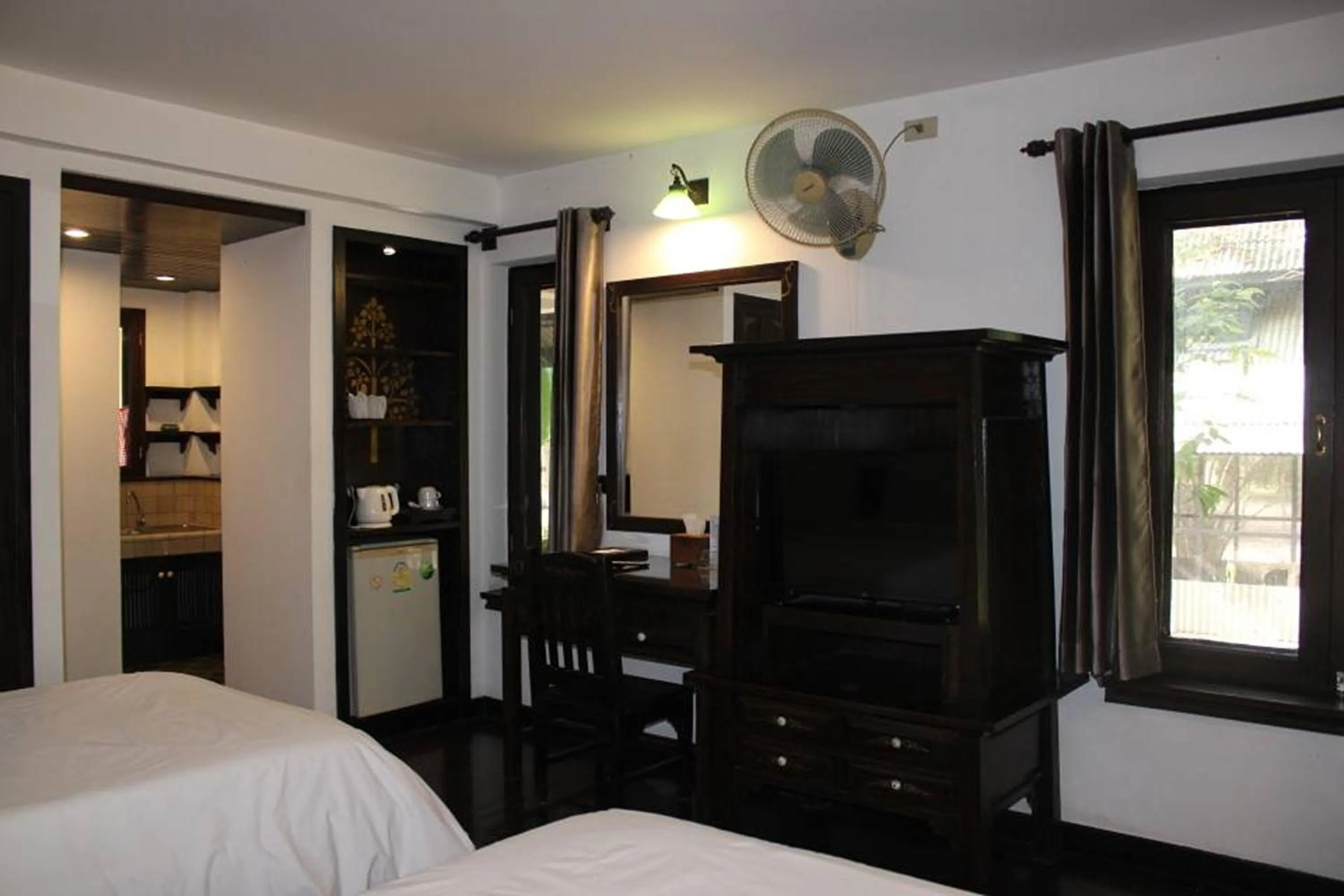 Bed in Baan Orawee Boutique Hotel