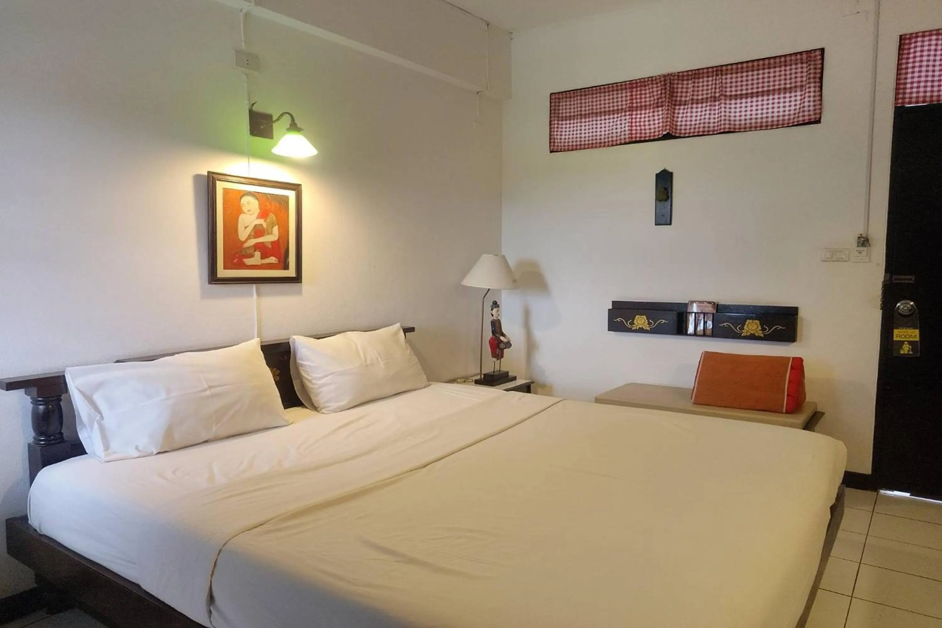 Bed in Baan Orawee Boutique Hotel