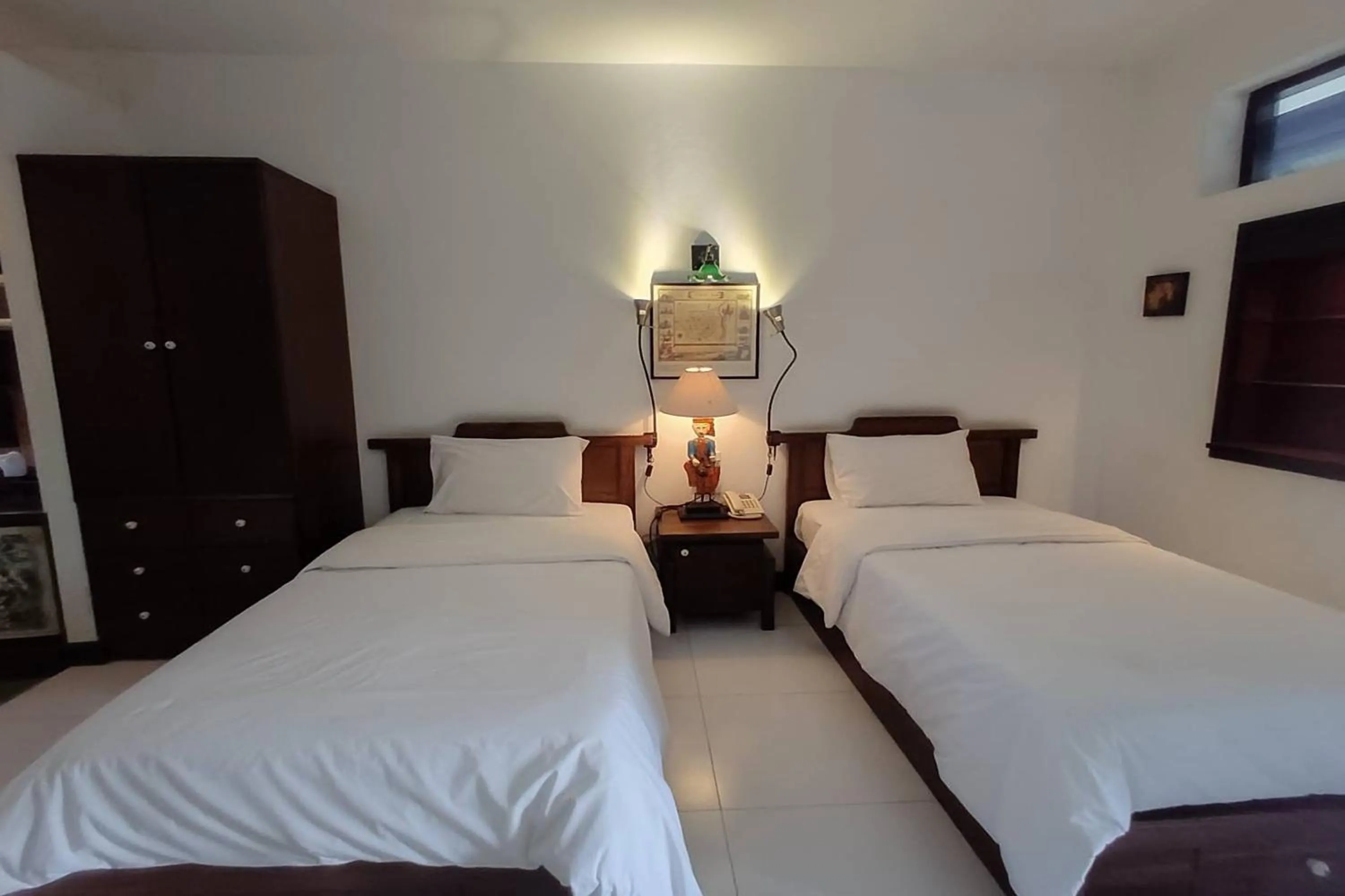 Bed in Baan Orawee Boutique Hotel