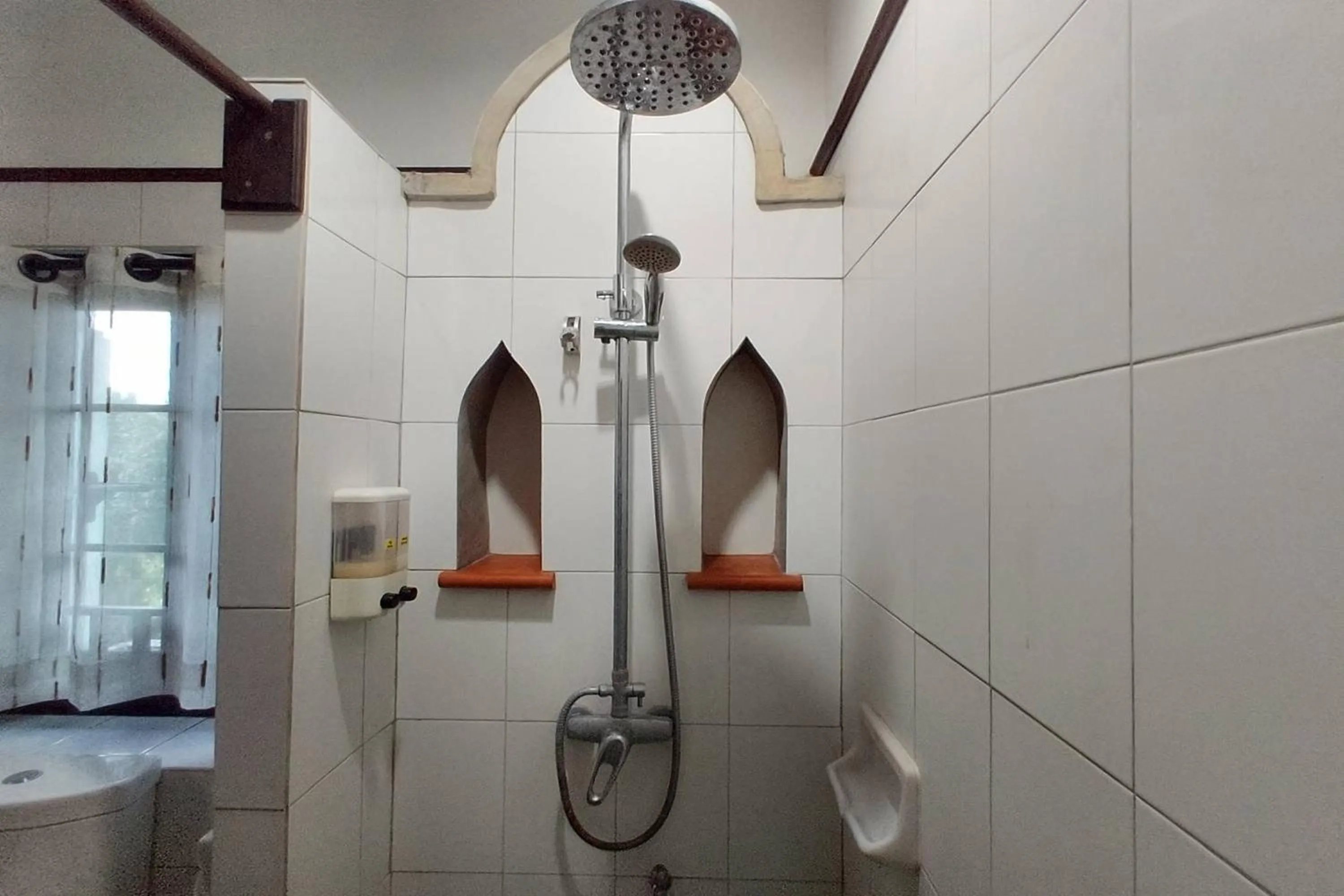 Shower in Baan Orawee Boutique Hotel