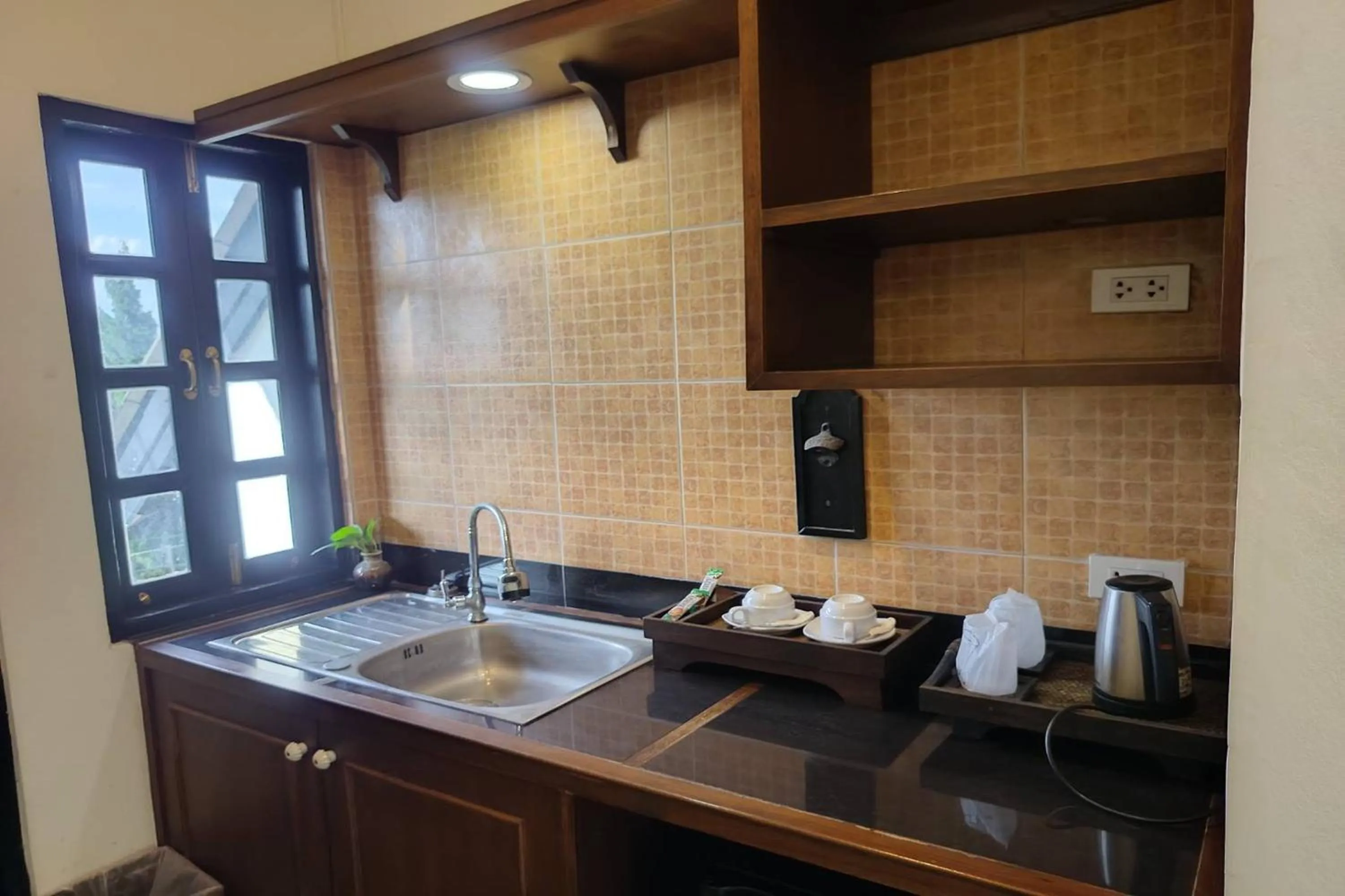 Kitchen or kitchenette in Baan Orawee Boutique Hotel