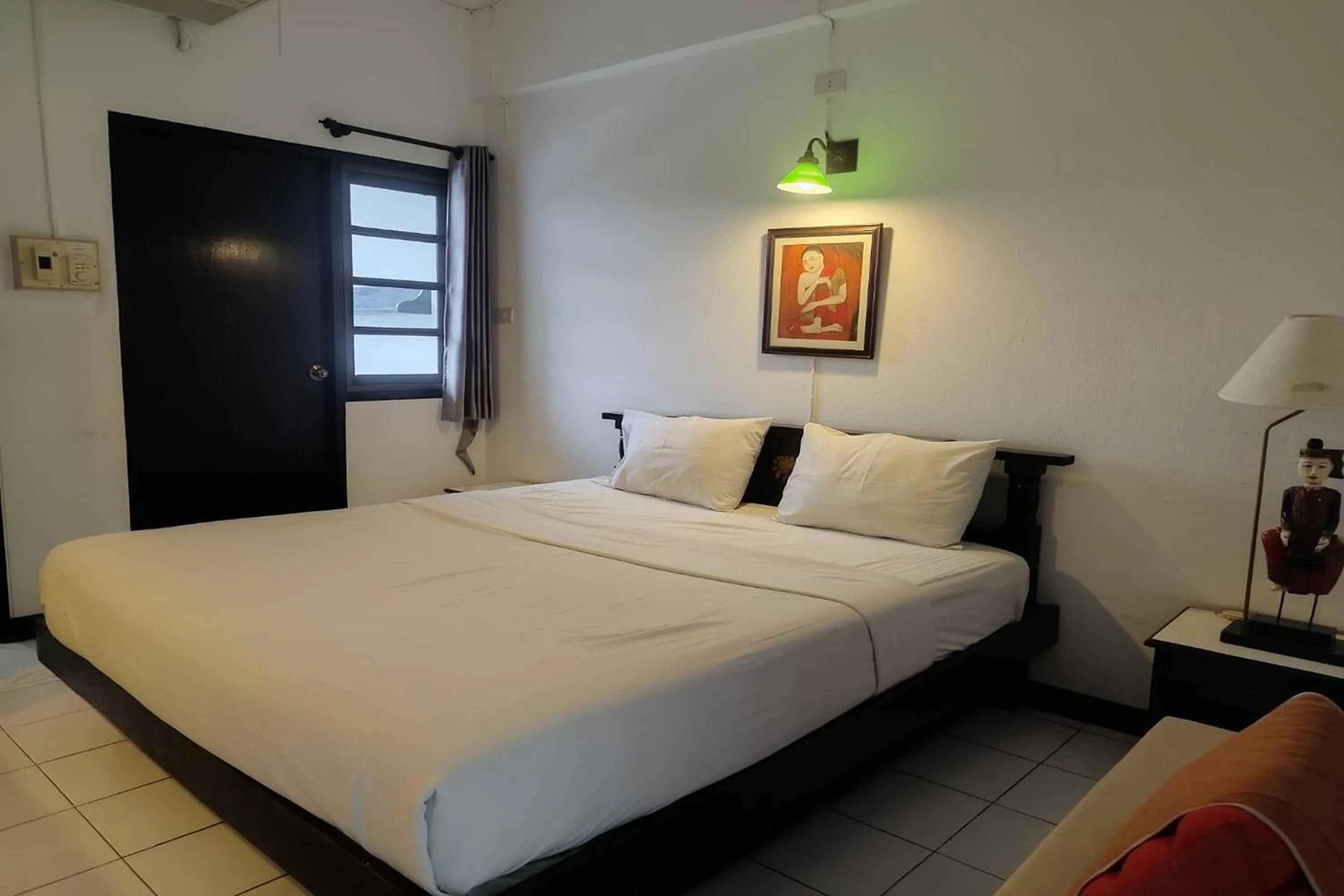 Bed in Baan Orawee Boutique Hotel