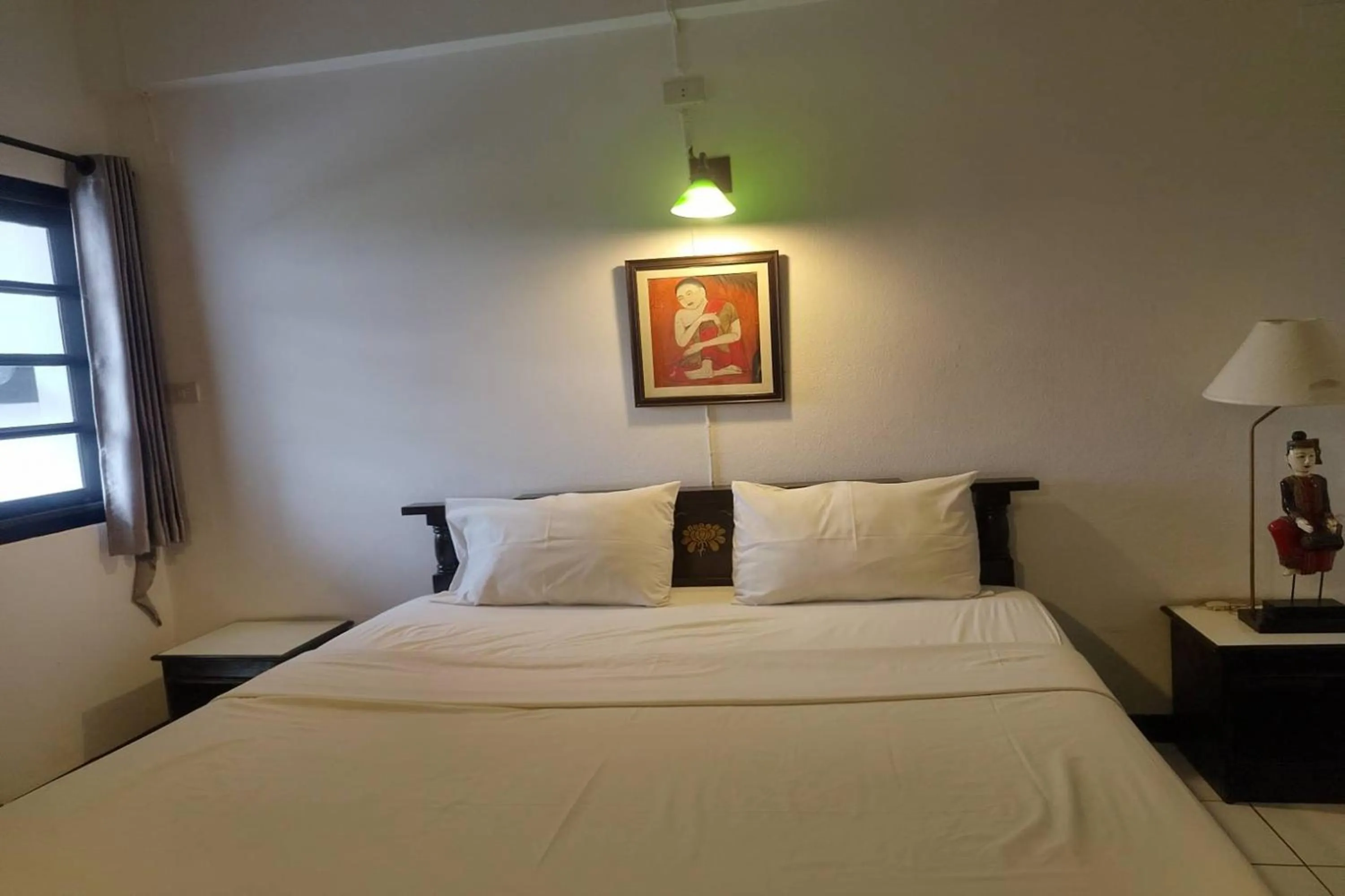 Bed in Baan Orawee Boutique Hotel