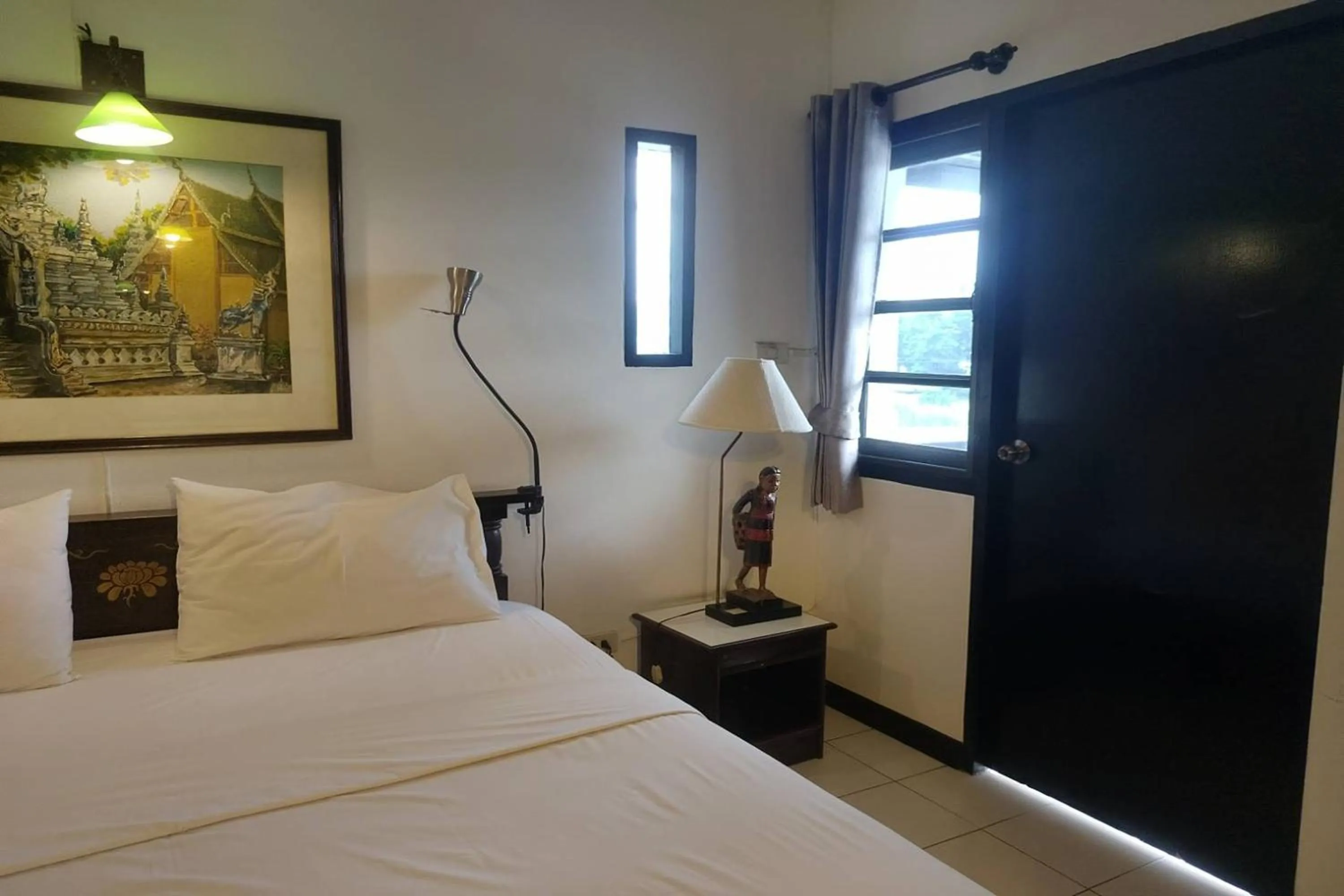 Bed in Baan Orawee Boutique Hotel