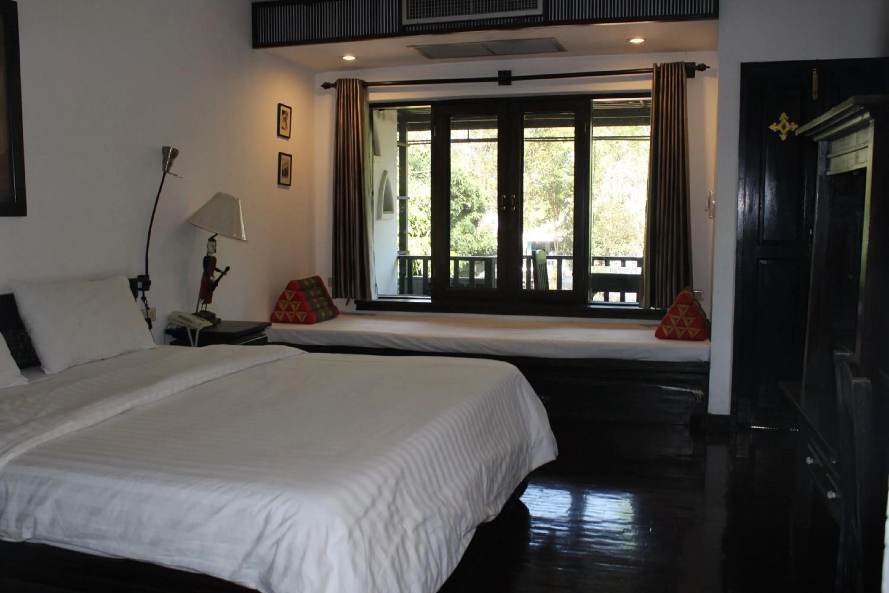 Bed in Baan Orawee Boutique Hotel