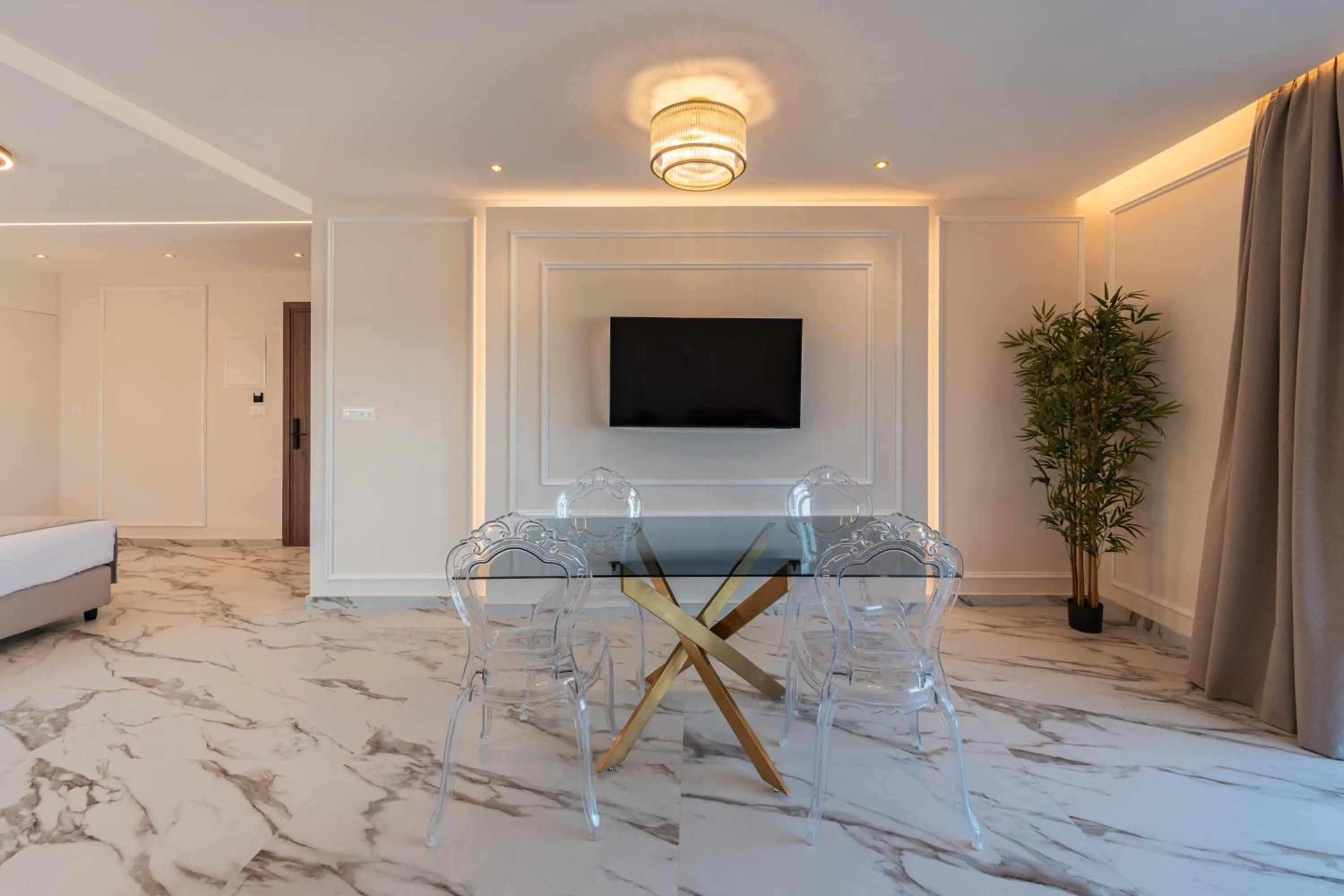 Living room, Bed in Philia Center Suites