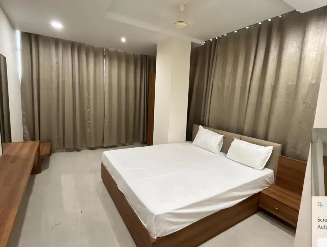 Bed in Hotel Tilak