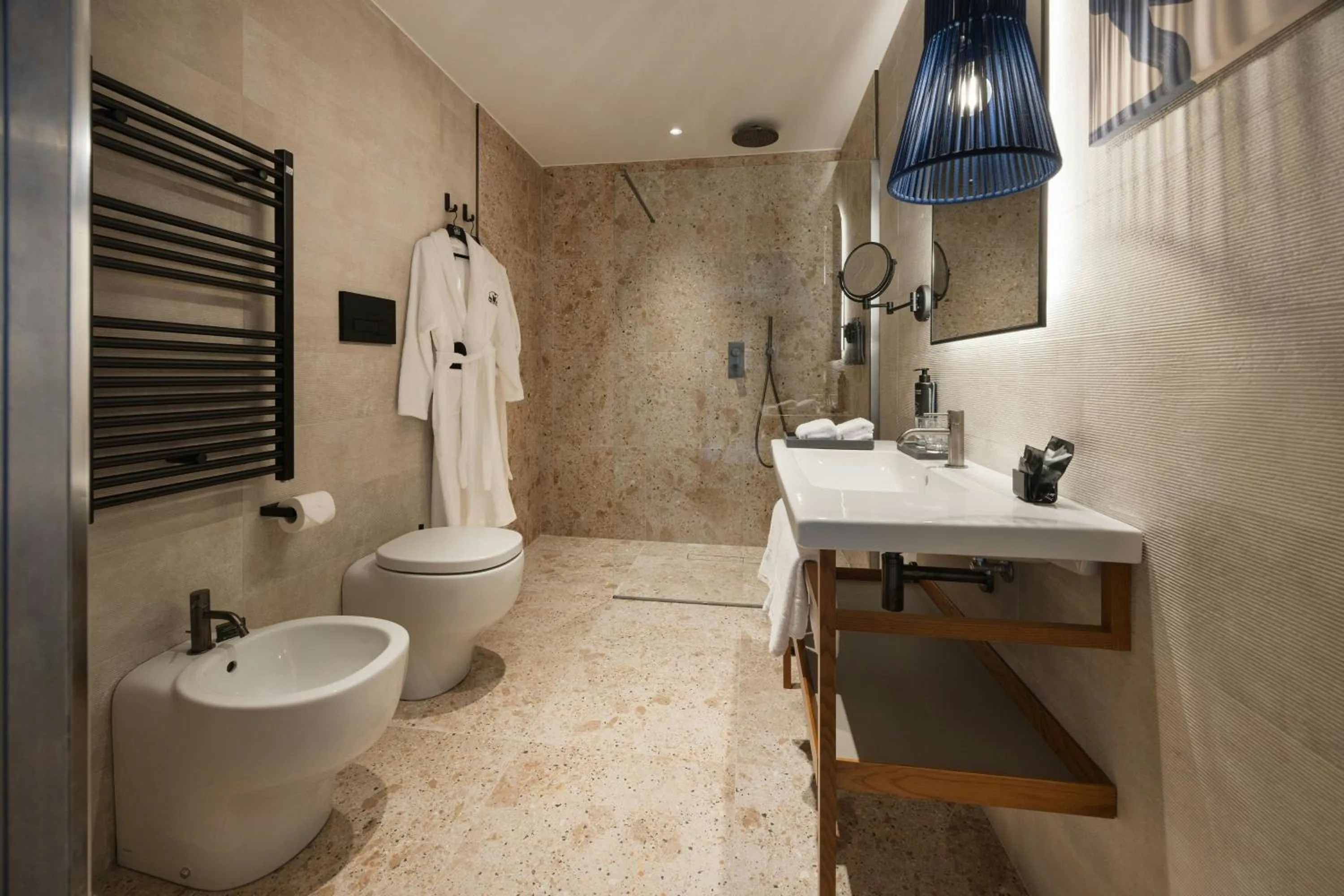 Bathroom in Cala Ponte, a Tribute Portfolio Hotel
