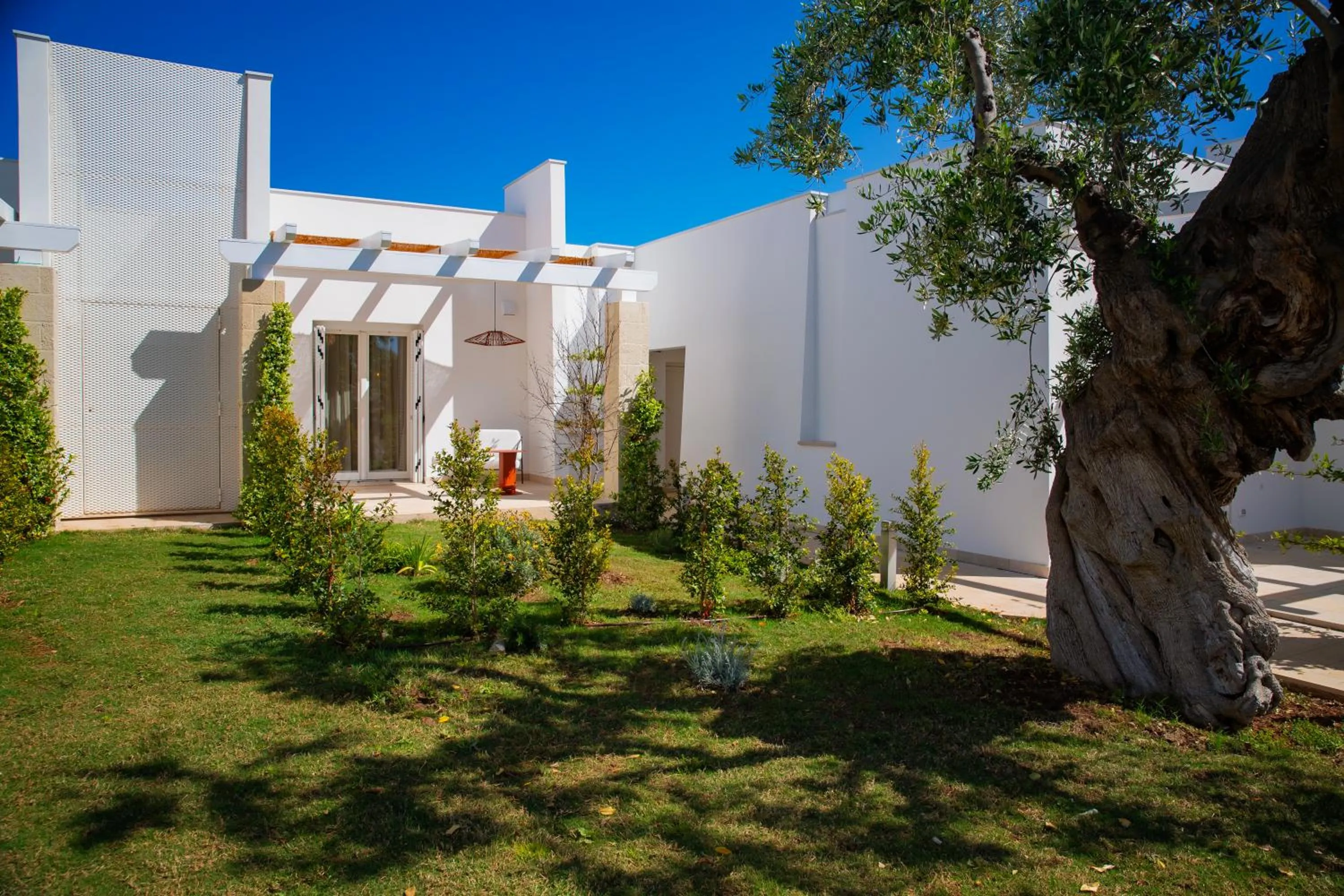 Garden view in Cala Ponte, a Tribute Portfolio Hotel