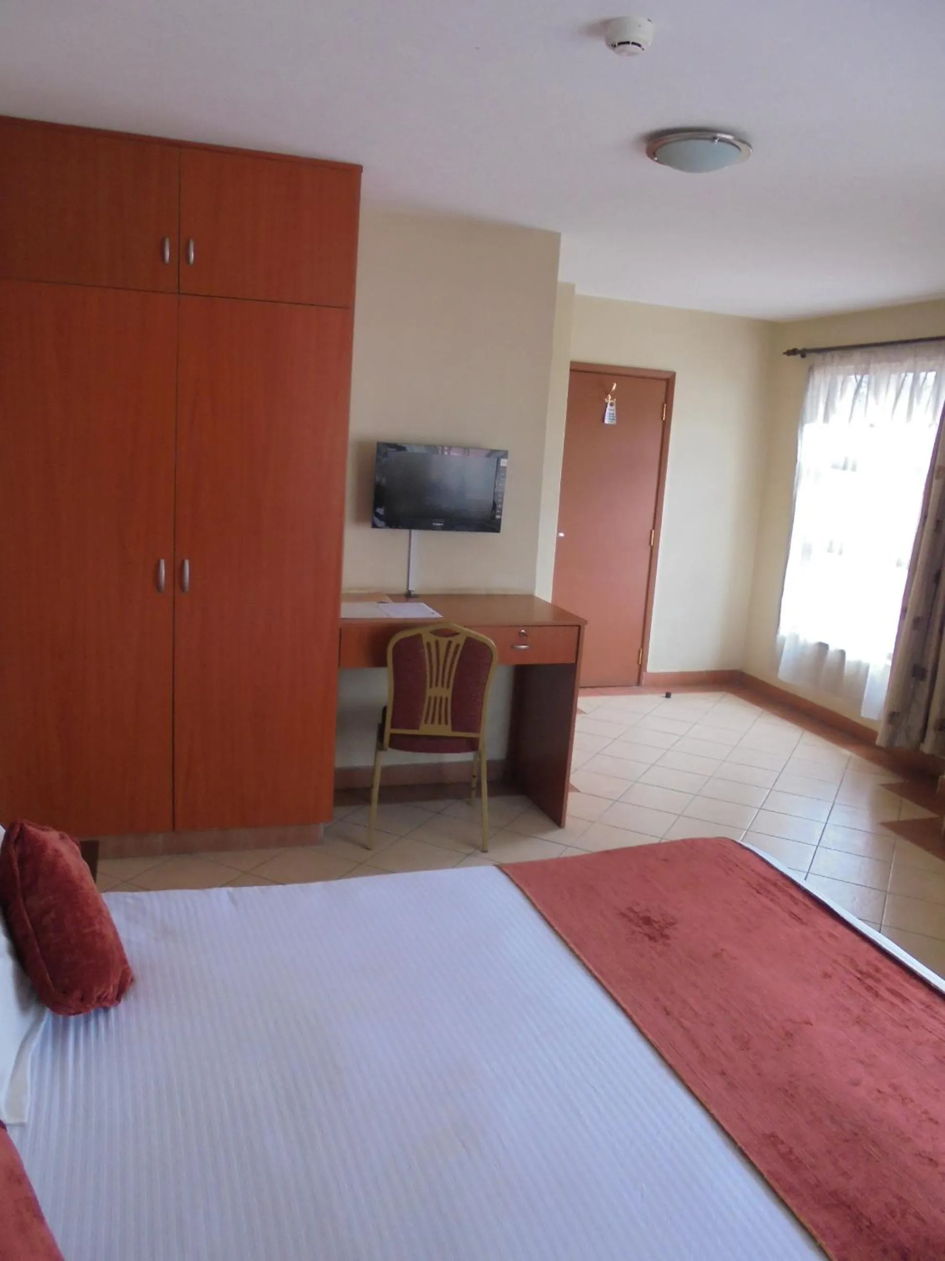 Photo of the whole room, Bed in Nairobi Transit Hotel