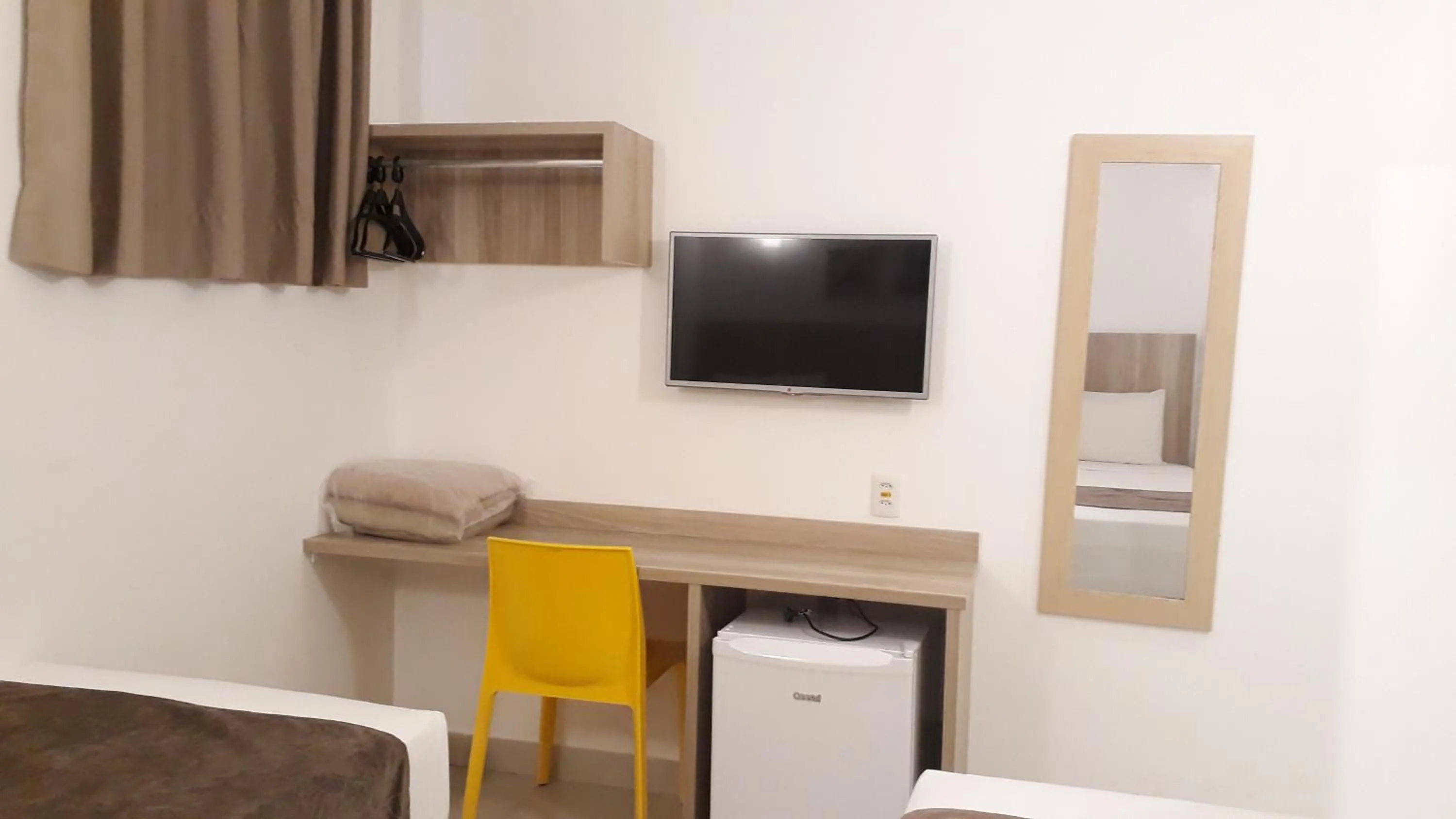 Communal lounge/ TV room in Pena Branca Hotel e Eventos