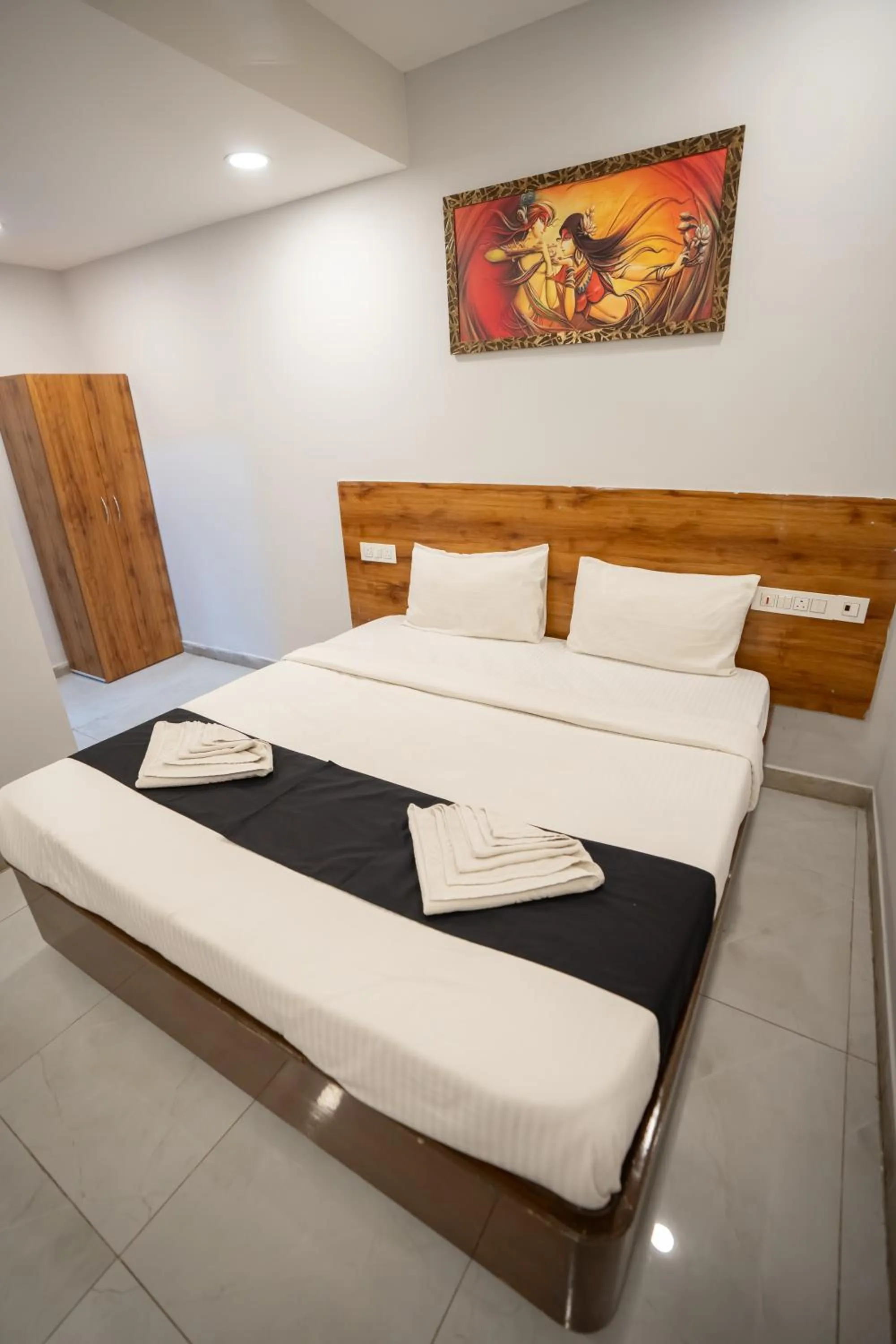 Bed in Hotel Vaishnavi Classic