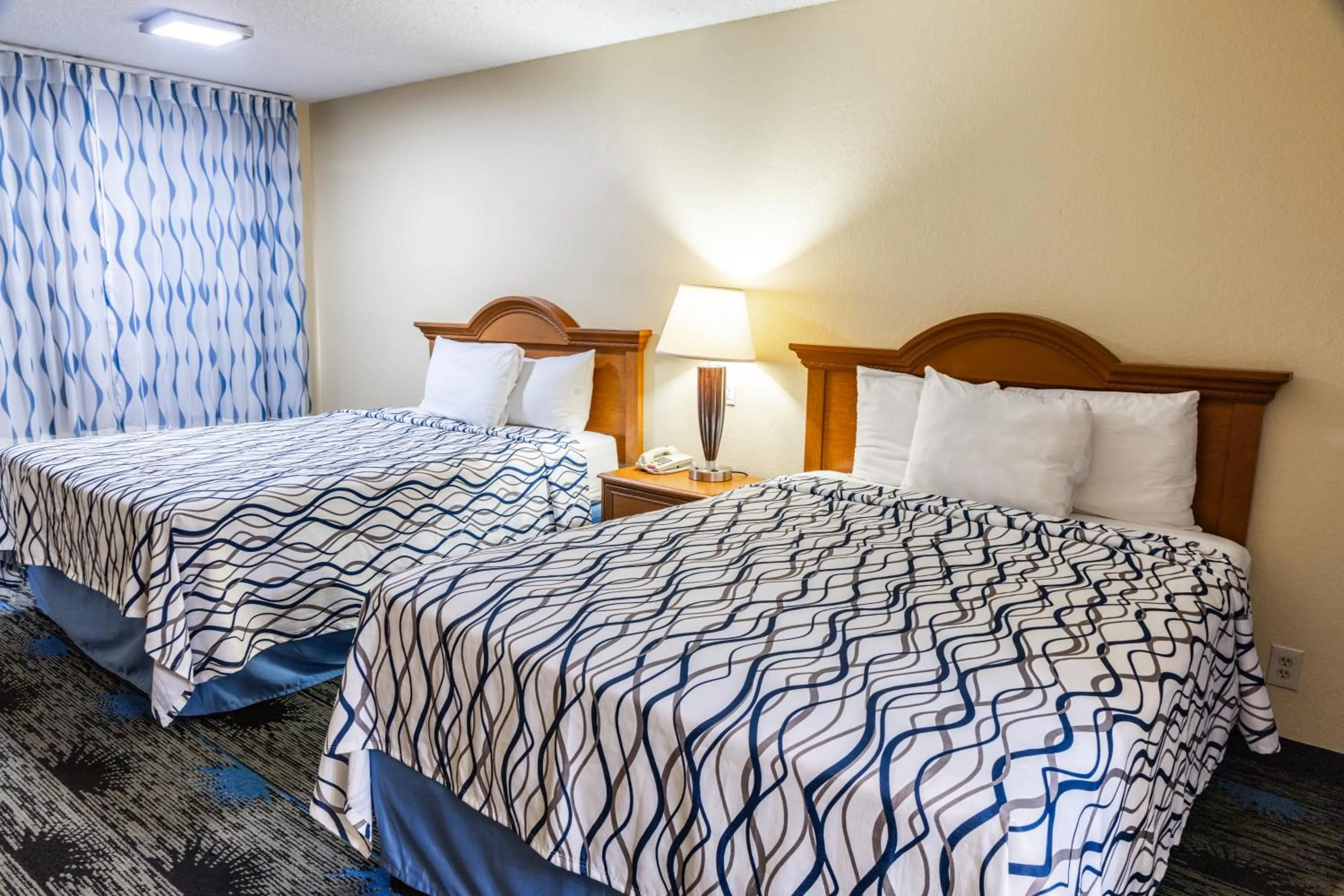 Bed in Boerne Inn and Suites