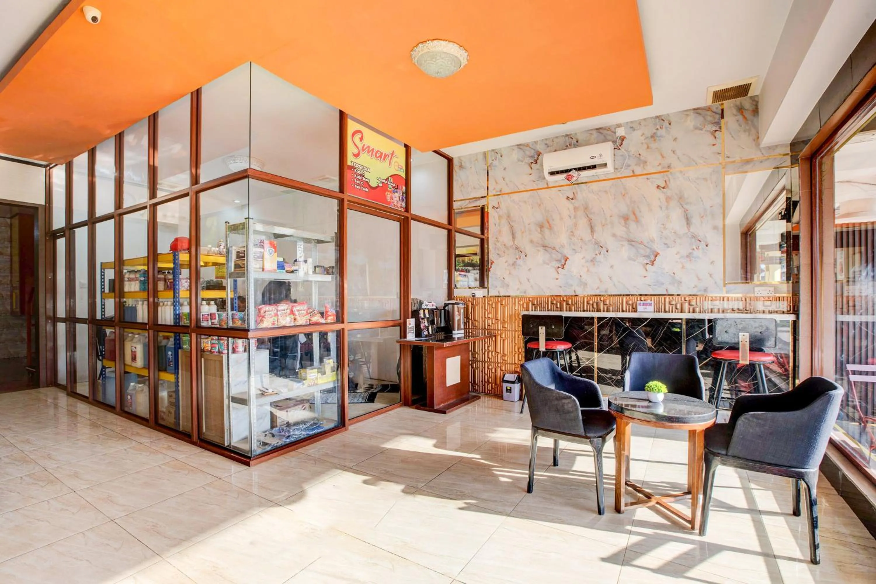 Seating area in Collection O Batam near DC Mall formerly S Hotel