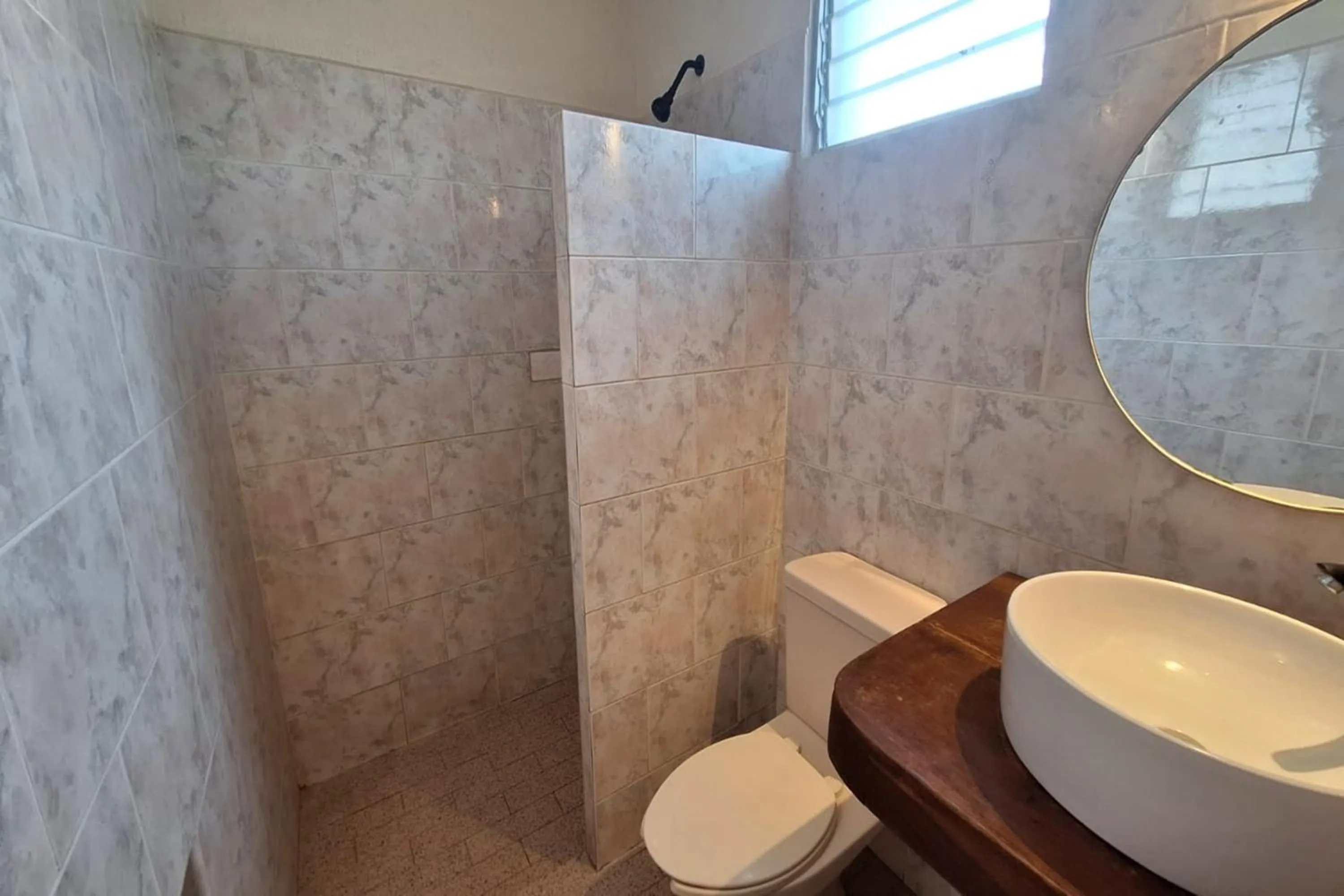 Bathroom in Capital O Hotel Rolovi Cancún