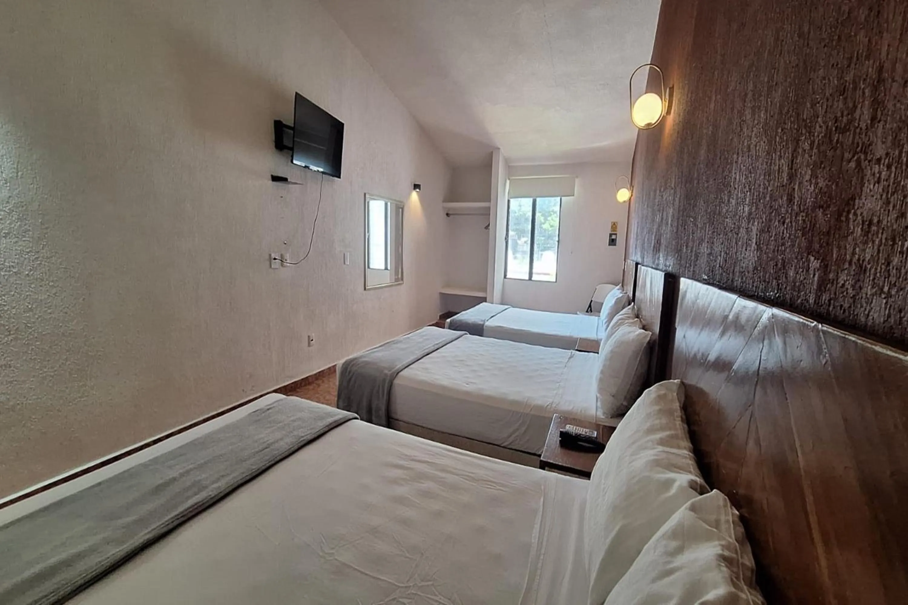 Bedroom, Bed in Capital O Hotel Rolovi Cancún