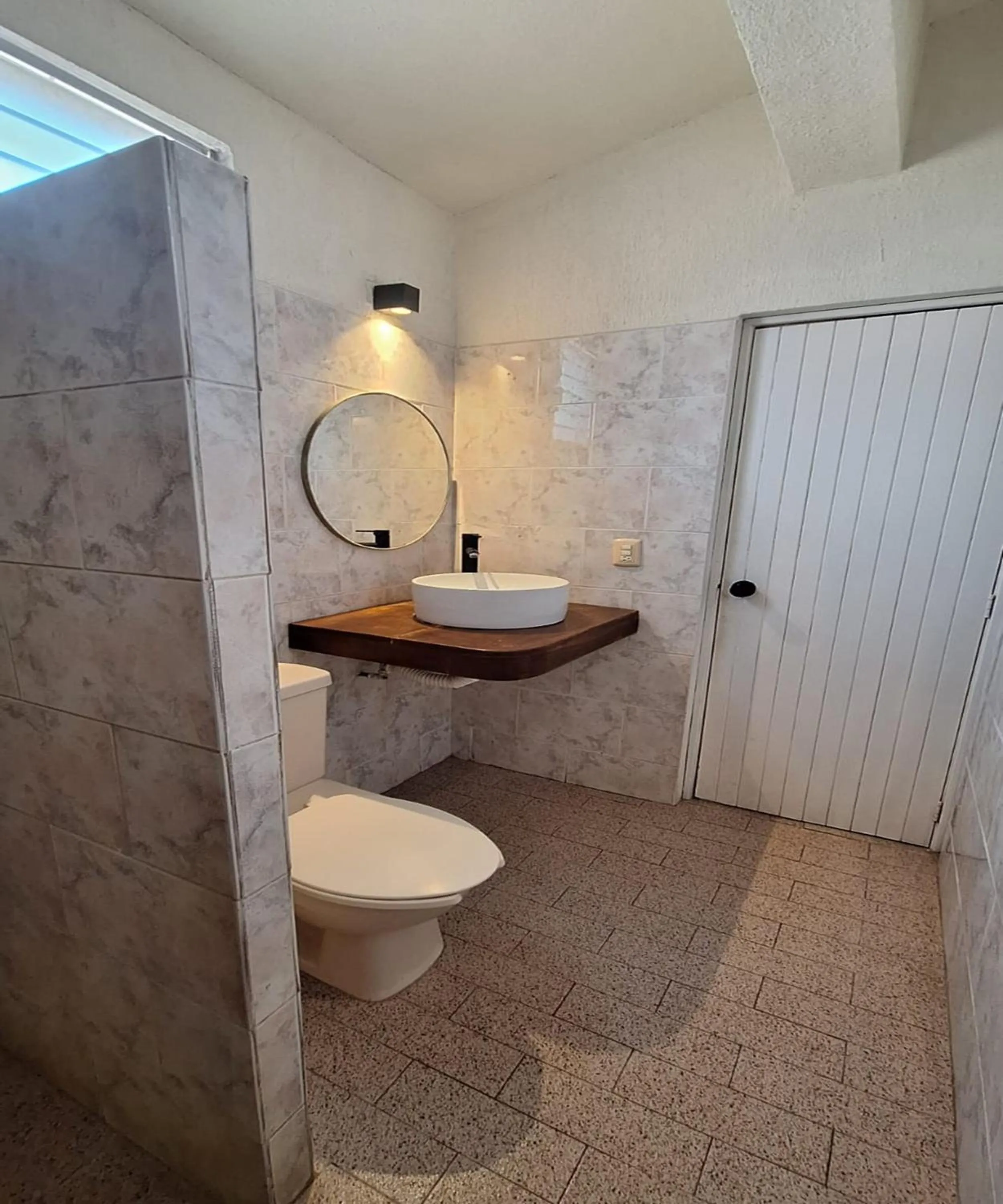 Bathroom in Capital O Hotel Rolovi Cancún