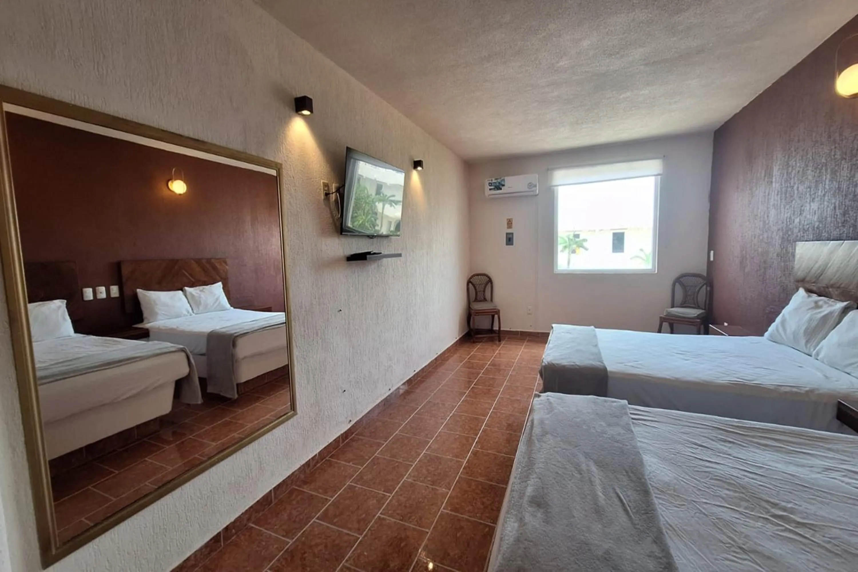 Bedroom, Bed in Capital O Hotel Rolovi Cancún