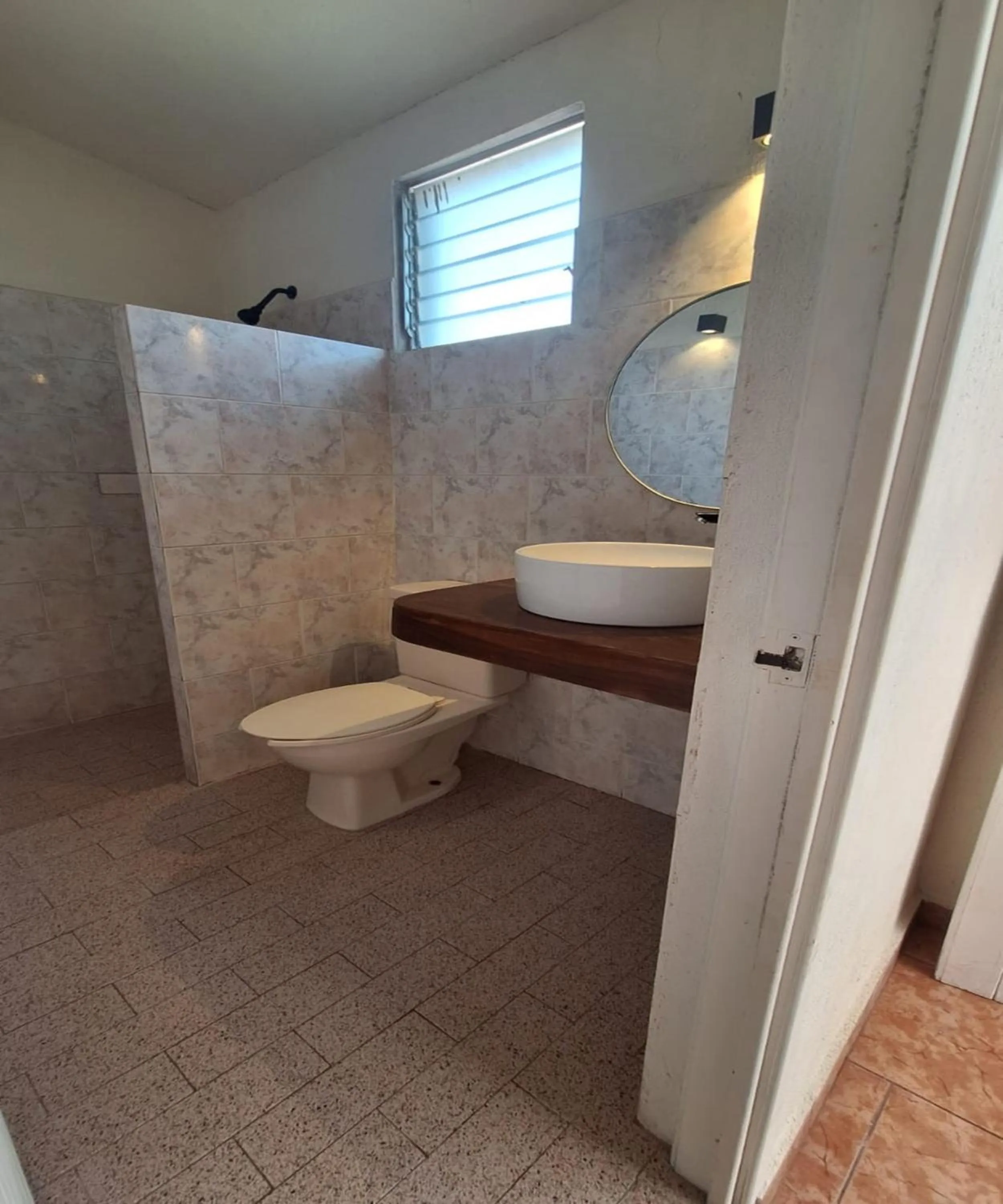 Bathroom in Capital O Hotel Rolovi Cancún