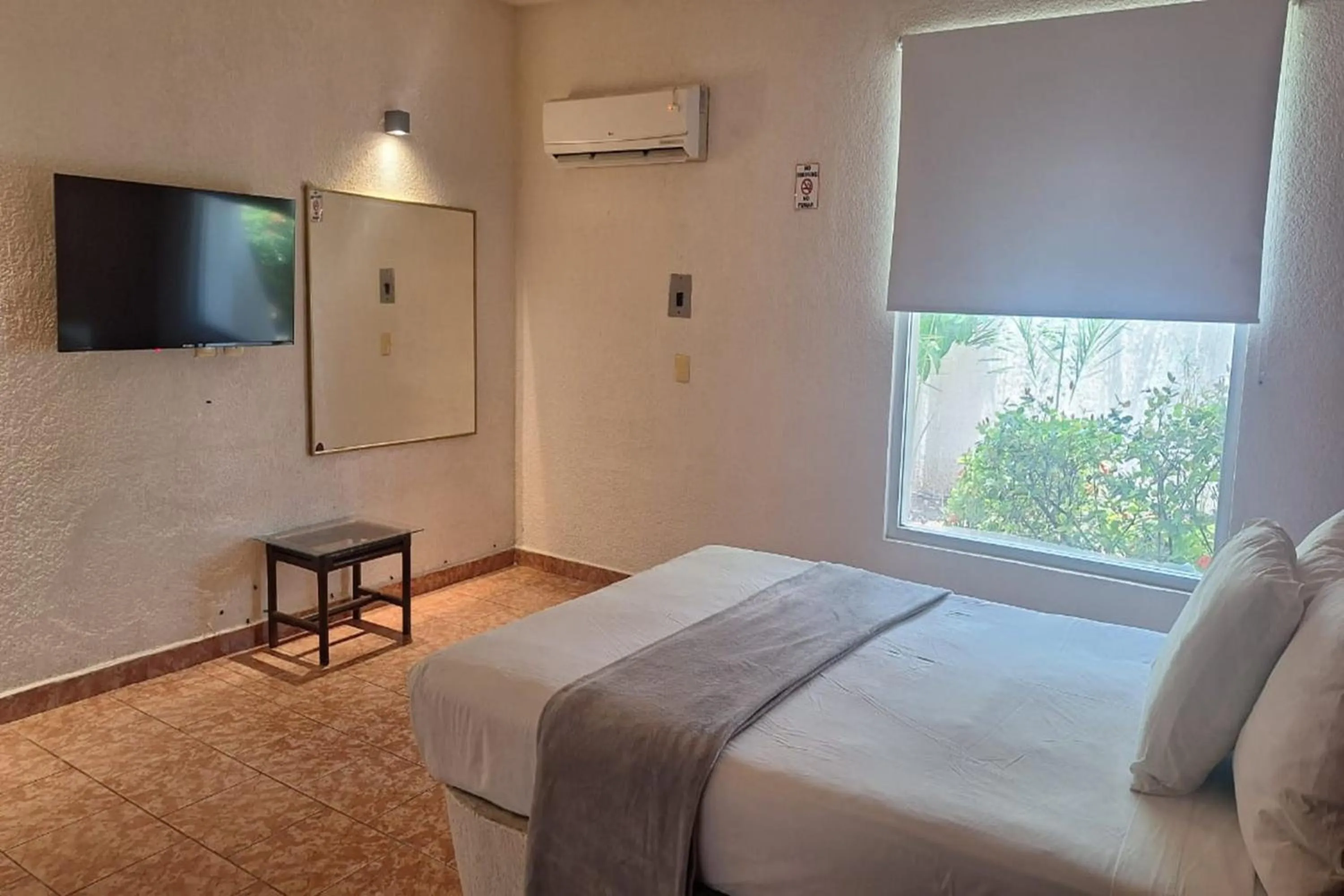 Bedroom, Bed in Capital O Hotel Rolovi Cancún