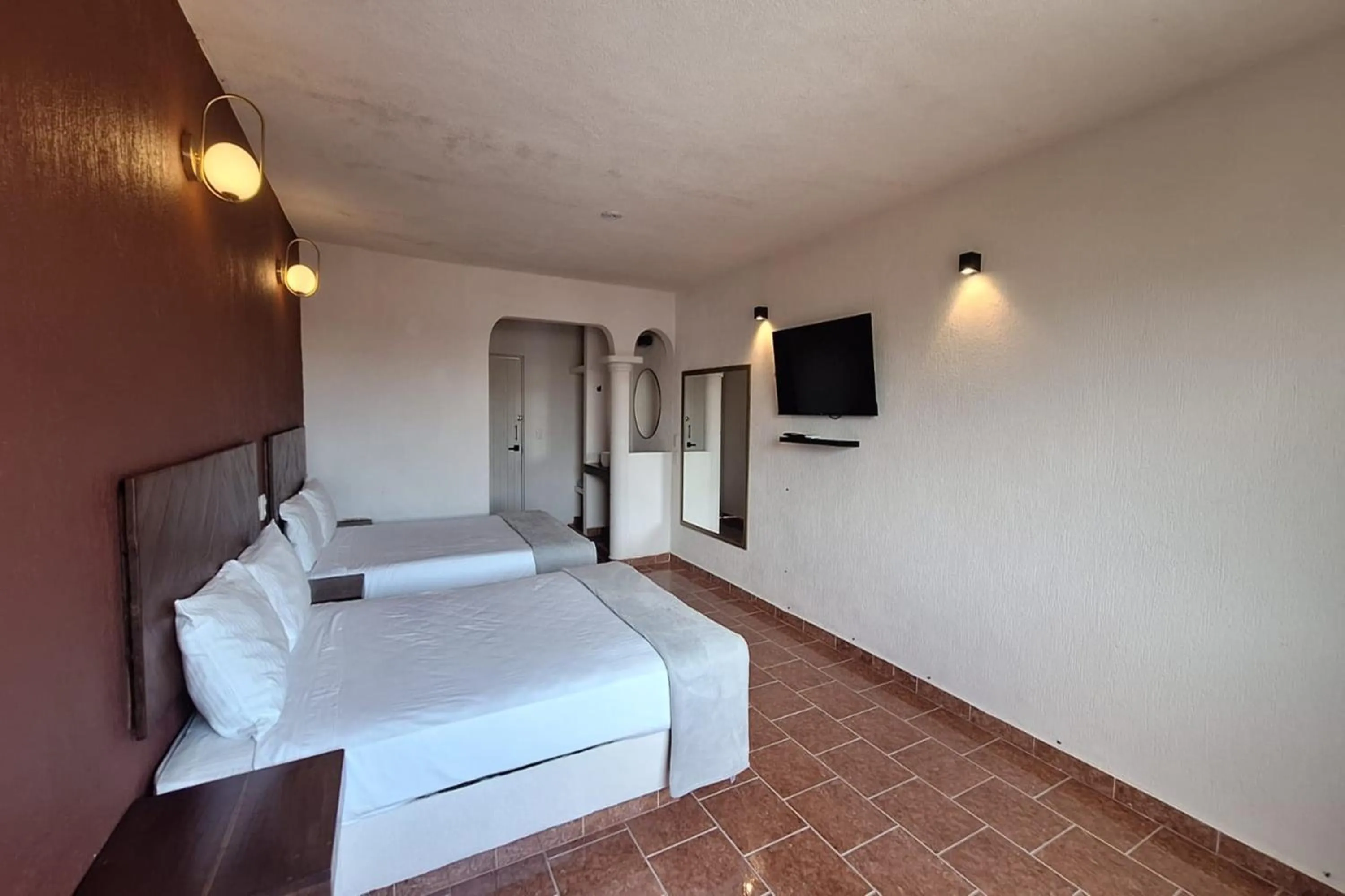 Bedroom, Bed in Capital O Hotel Rolovi Cancún