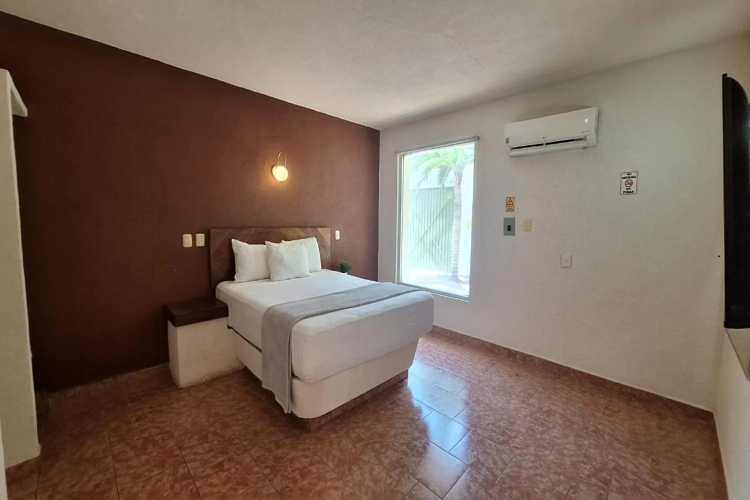 Bedroom, Bed in Capital O Hotel Rolovi Cancún