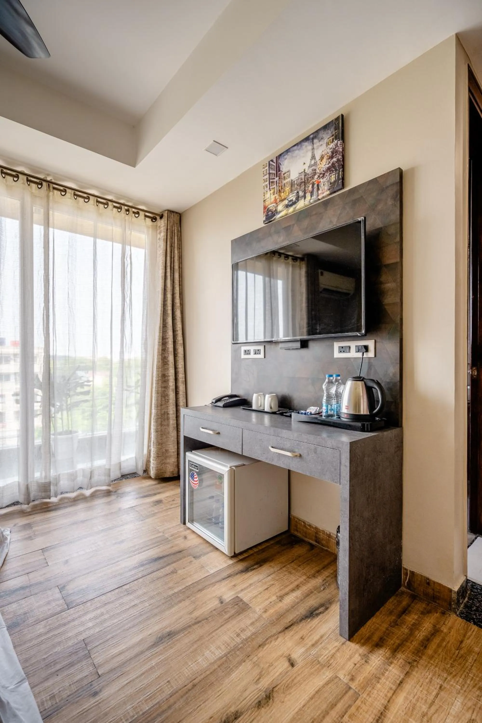 TV and multimedia in Lime Tree Hotel - Near Medanta Hospital