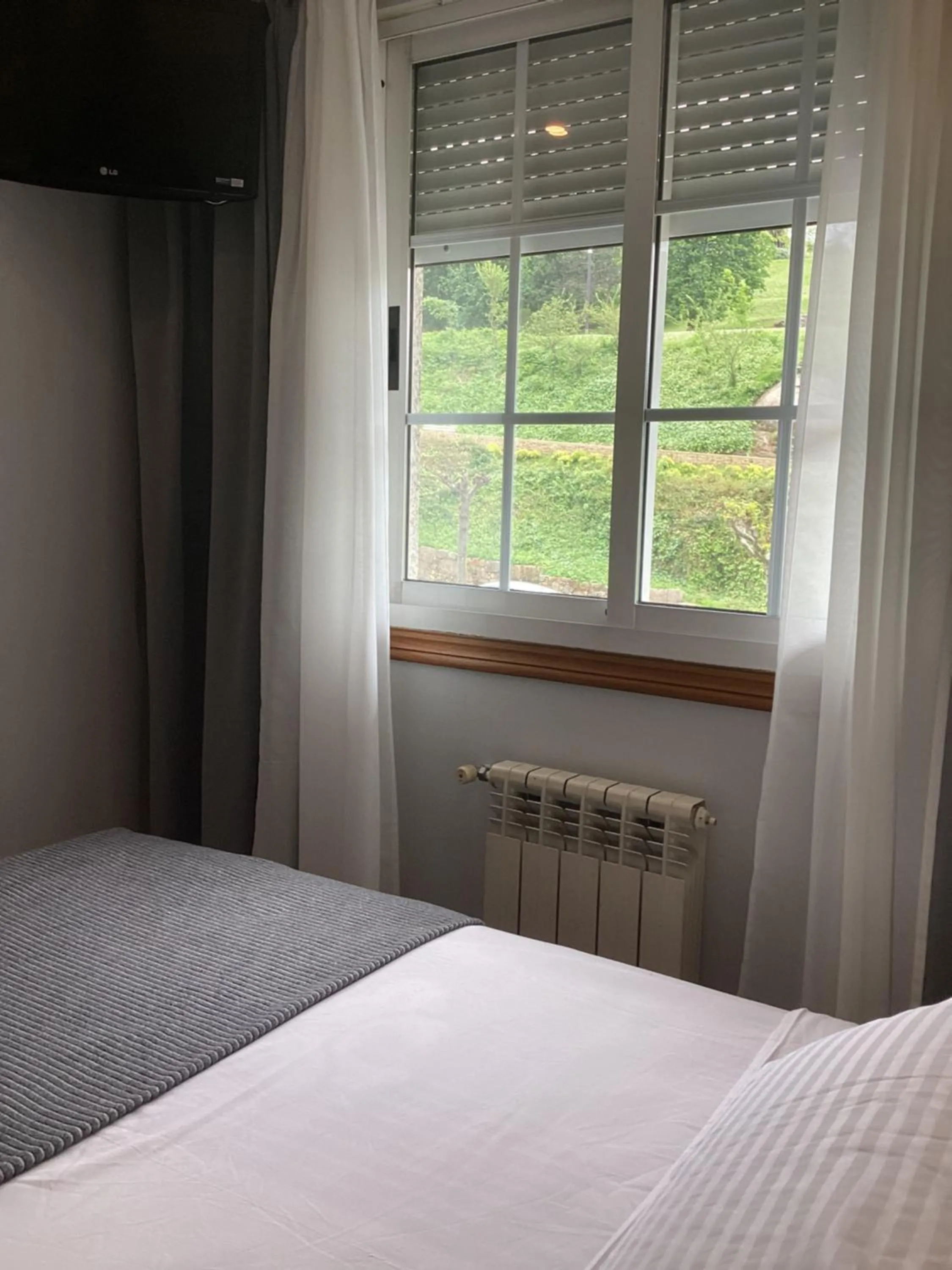 Bed in Saudade Hostal Cafetería