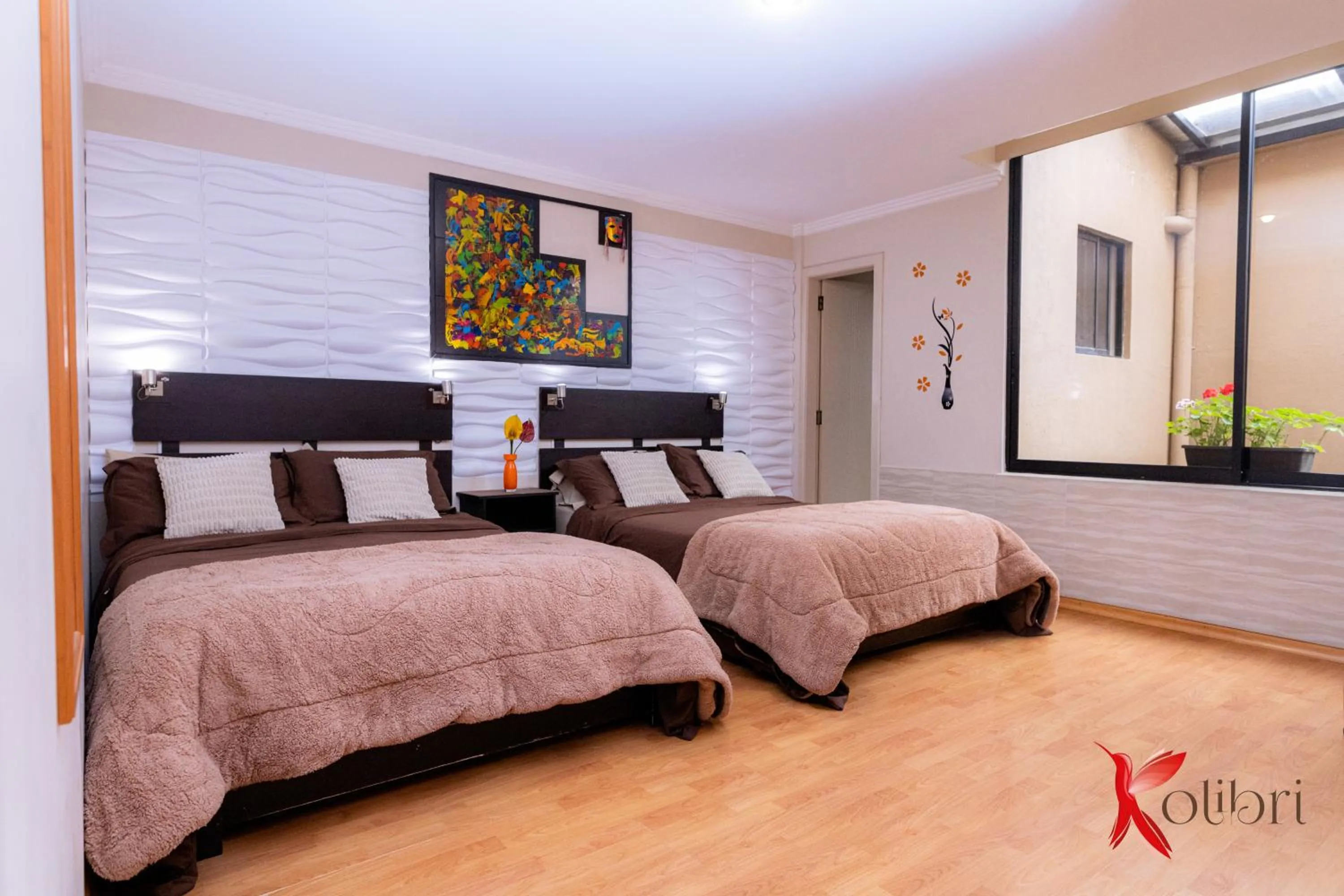 Bedroom in Hostal Kolibri B&B