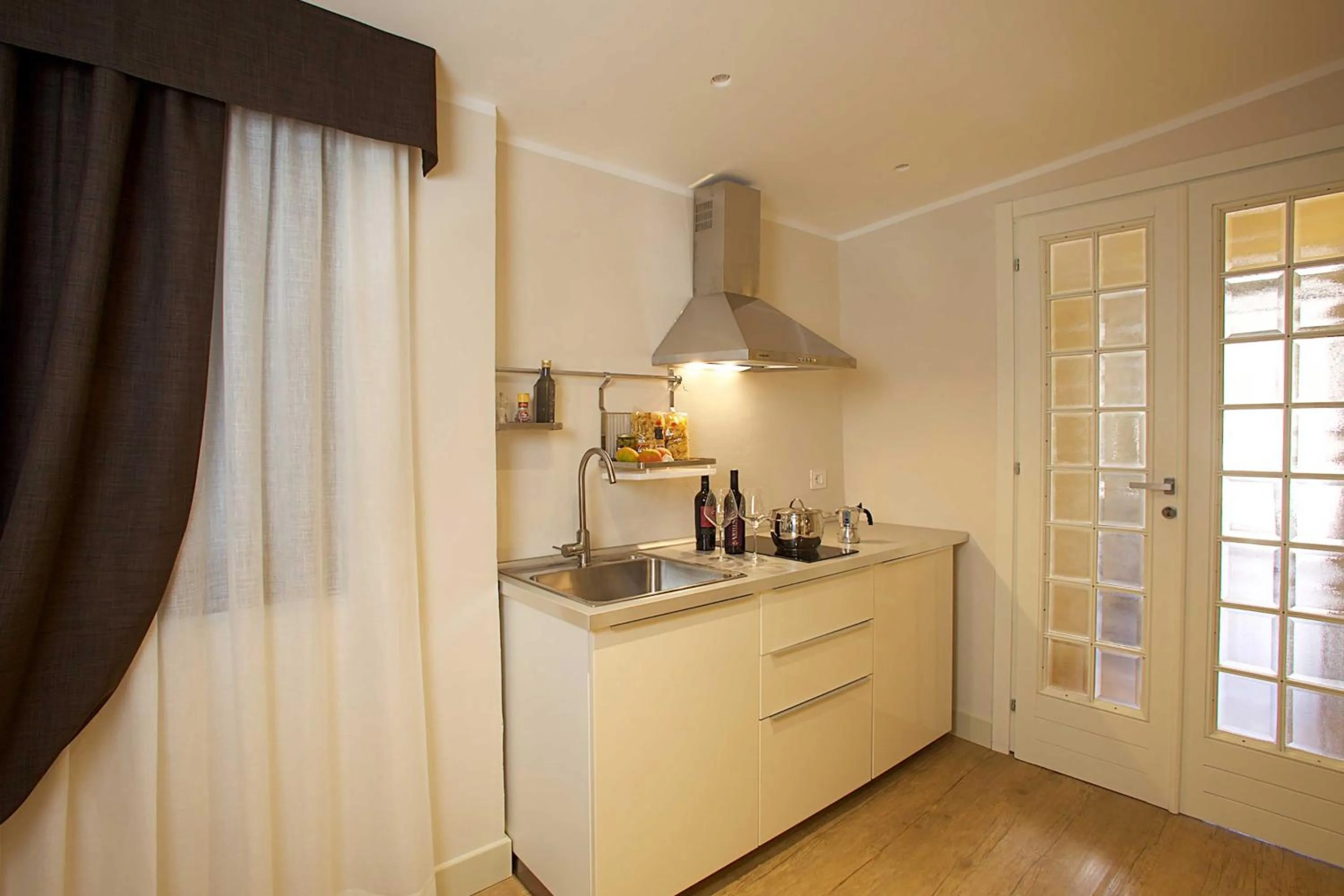 Kitchen or kitchenette in Hotel Vatluna
