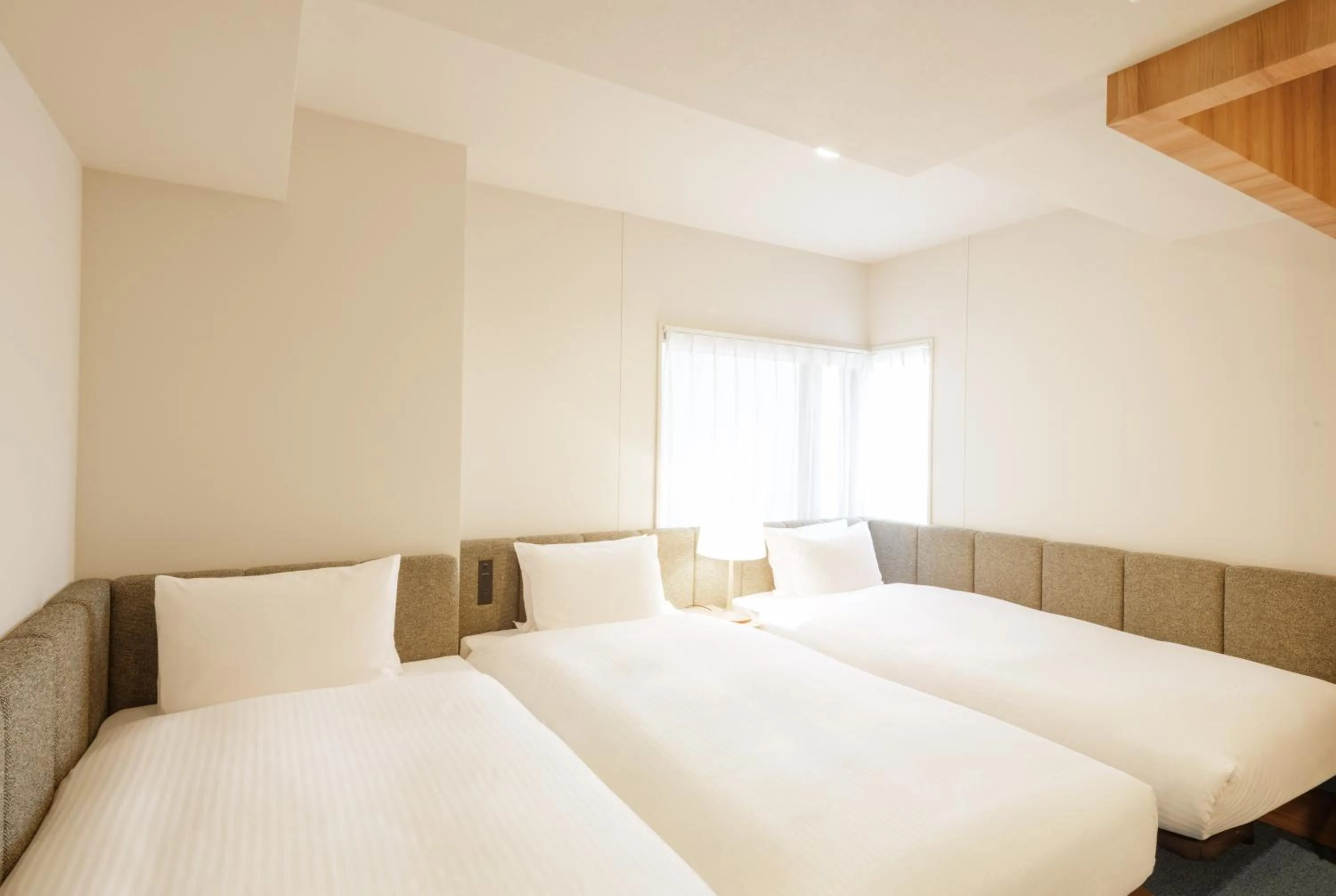 Bed in HOTEL AMANEK Asakusa Sakurabashi