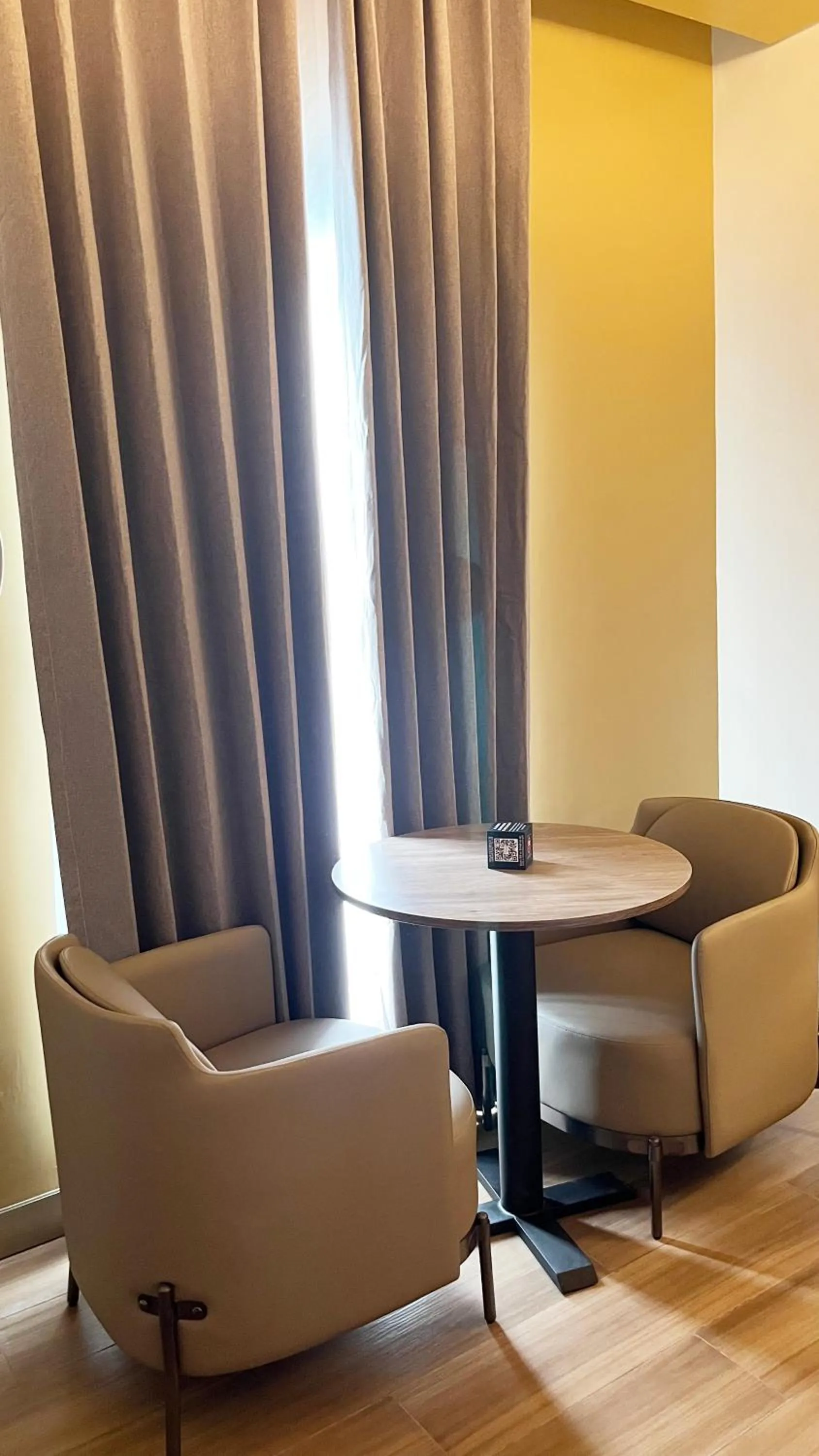 Seating area in Vibe Hotel Alabang