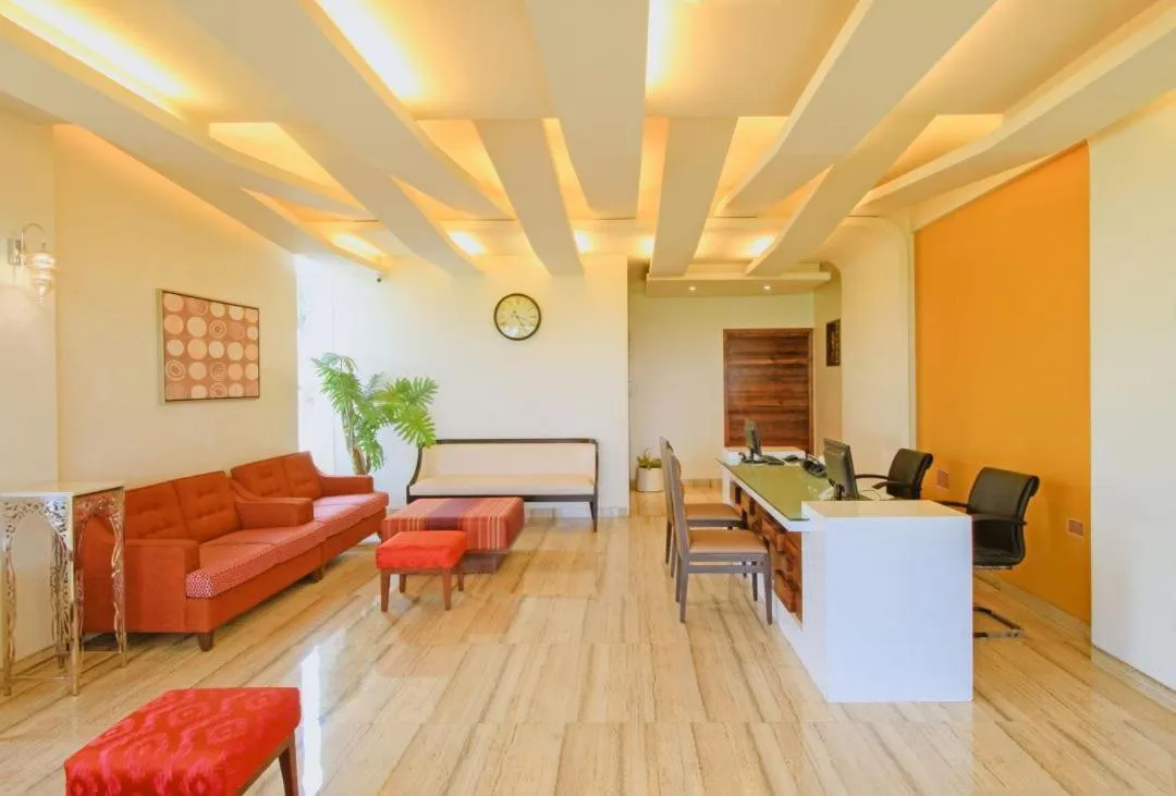 Lobby or reception in Shamrock Greens by Jardin Hotels