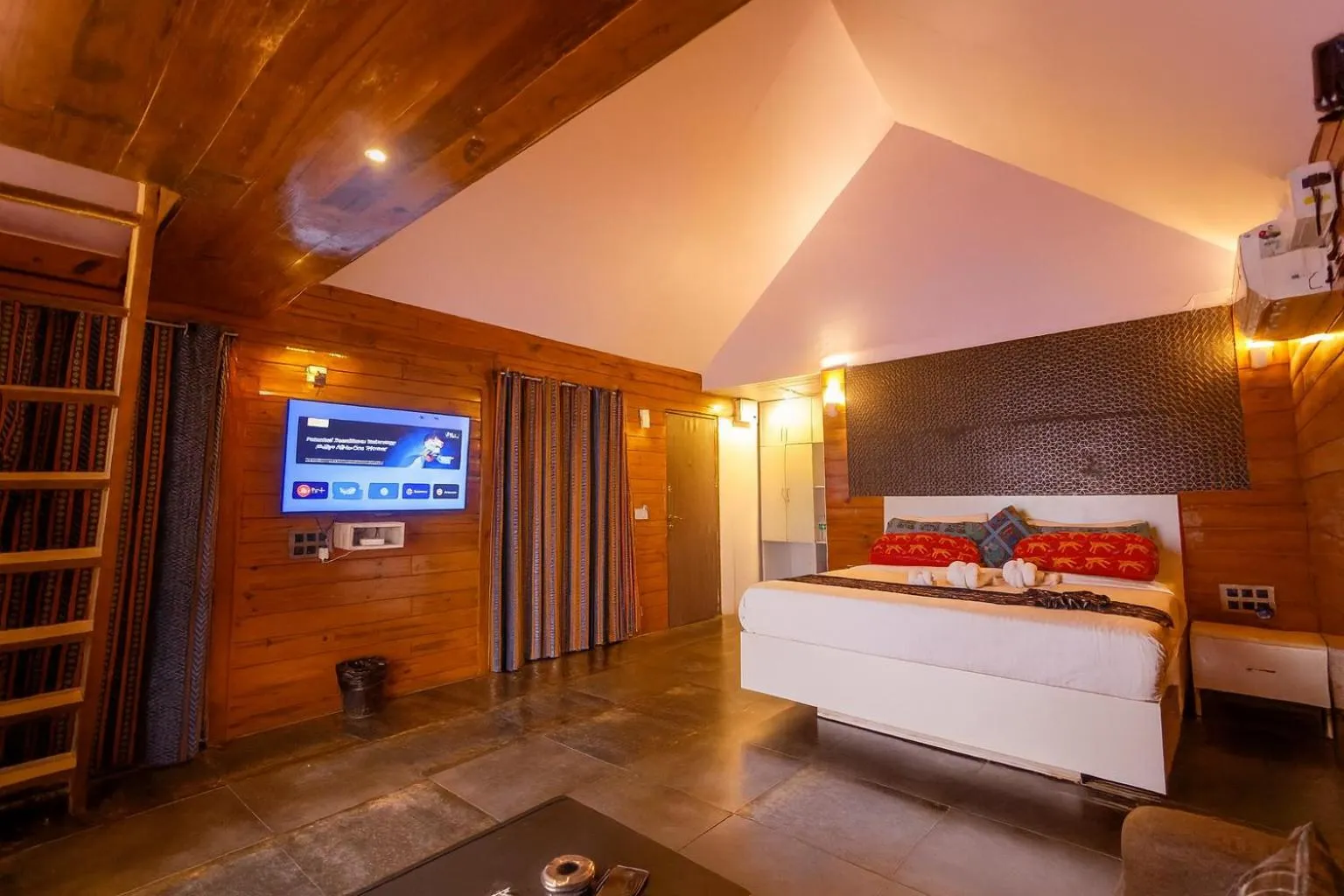 Bed in Rumourss Sky Villa & Resort