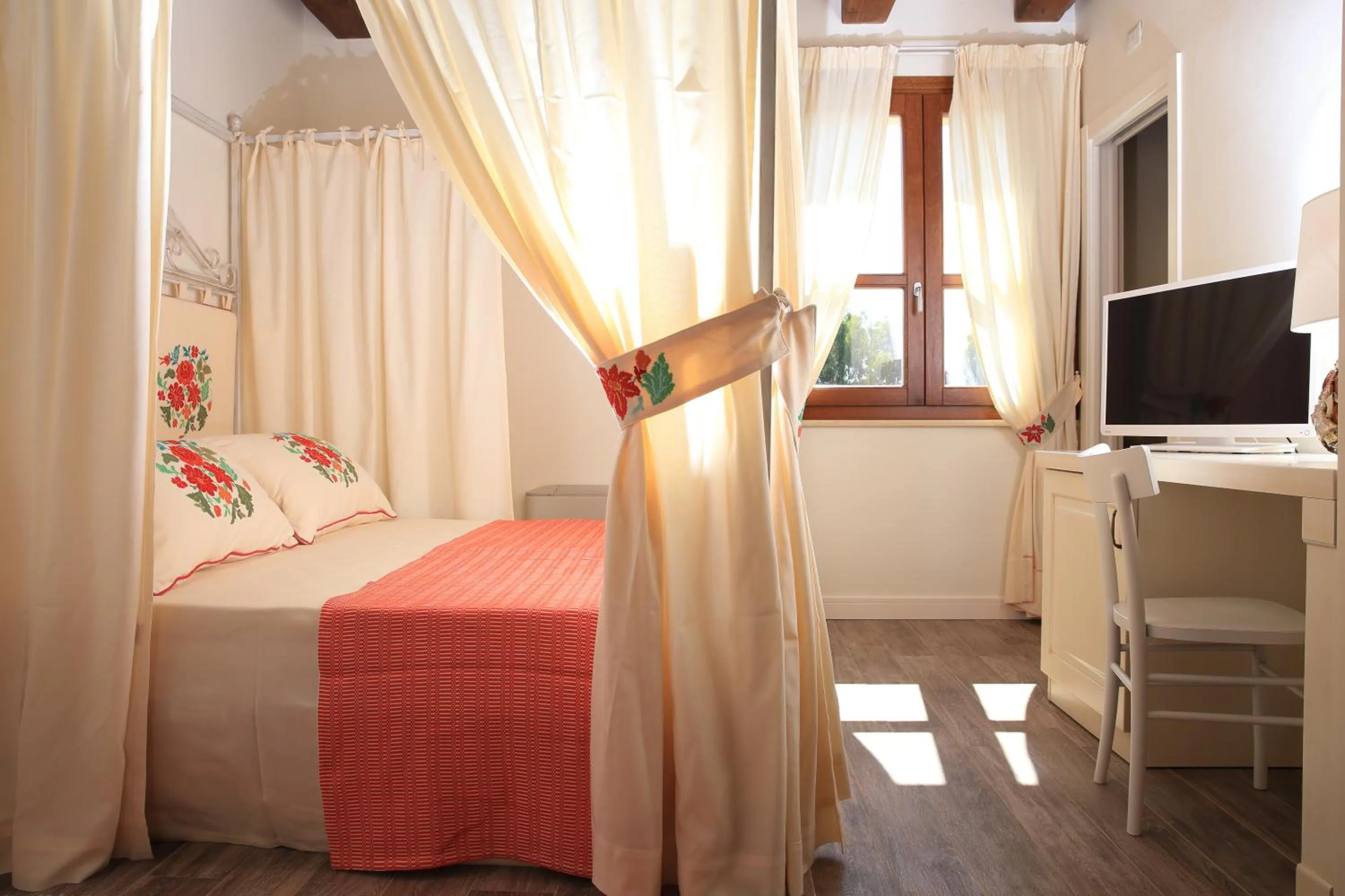 Bed in Inghirios Wellness Country Resort